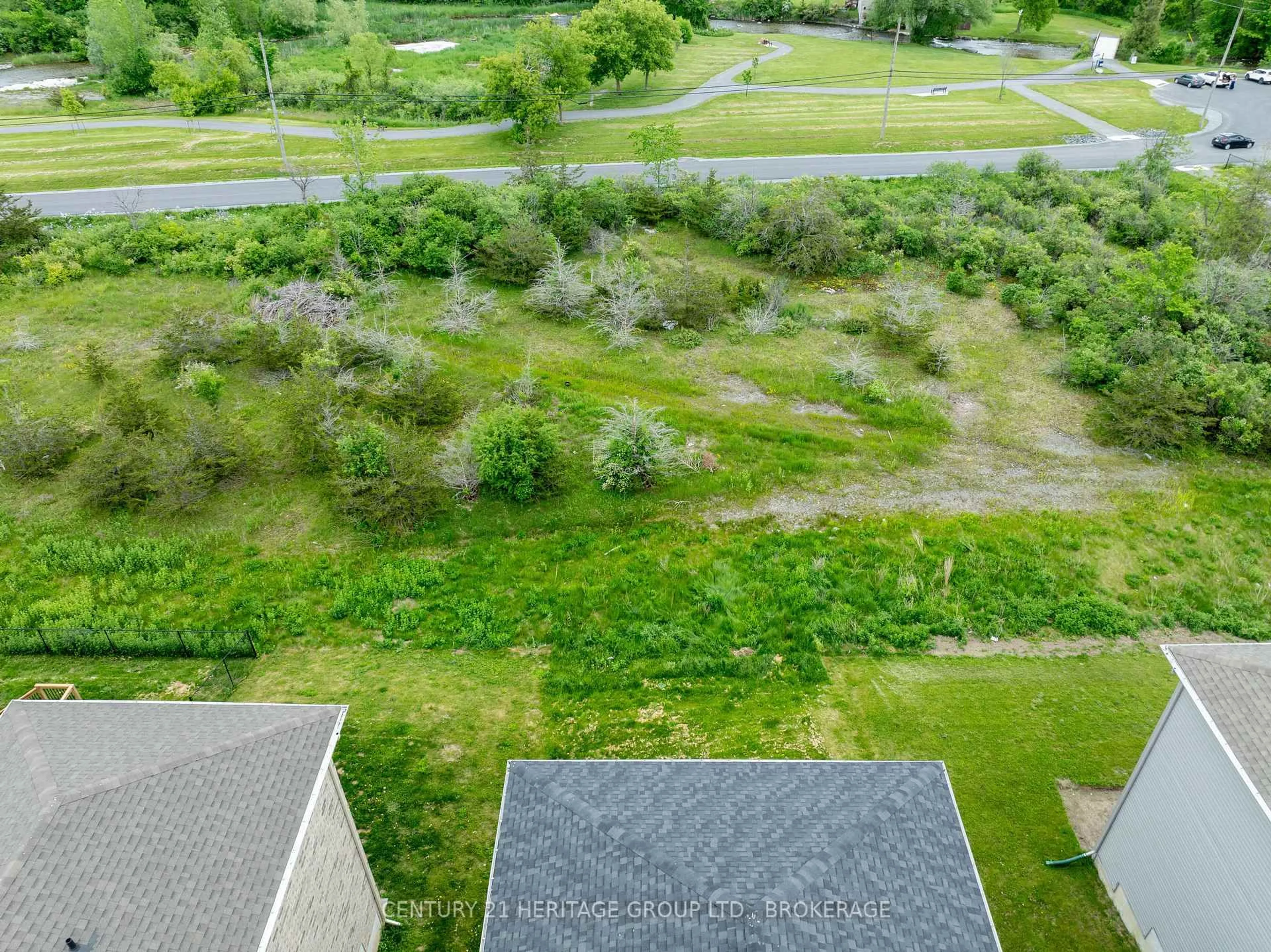 A pic from outside/outdoor area/front of a property/back of a property/a pic from drone, water/lake/river/ocean view for 104 Brennan Cres, Bissett Creek Ontario K0H 2H0