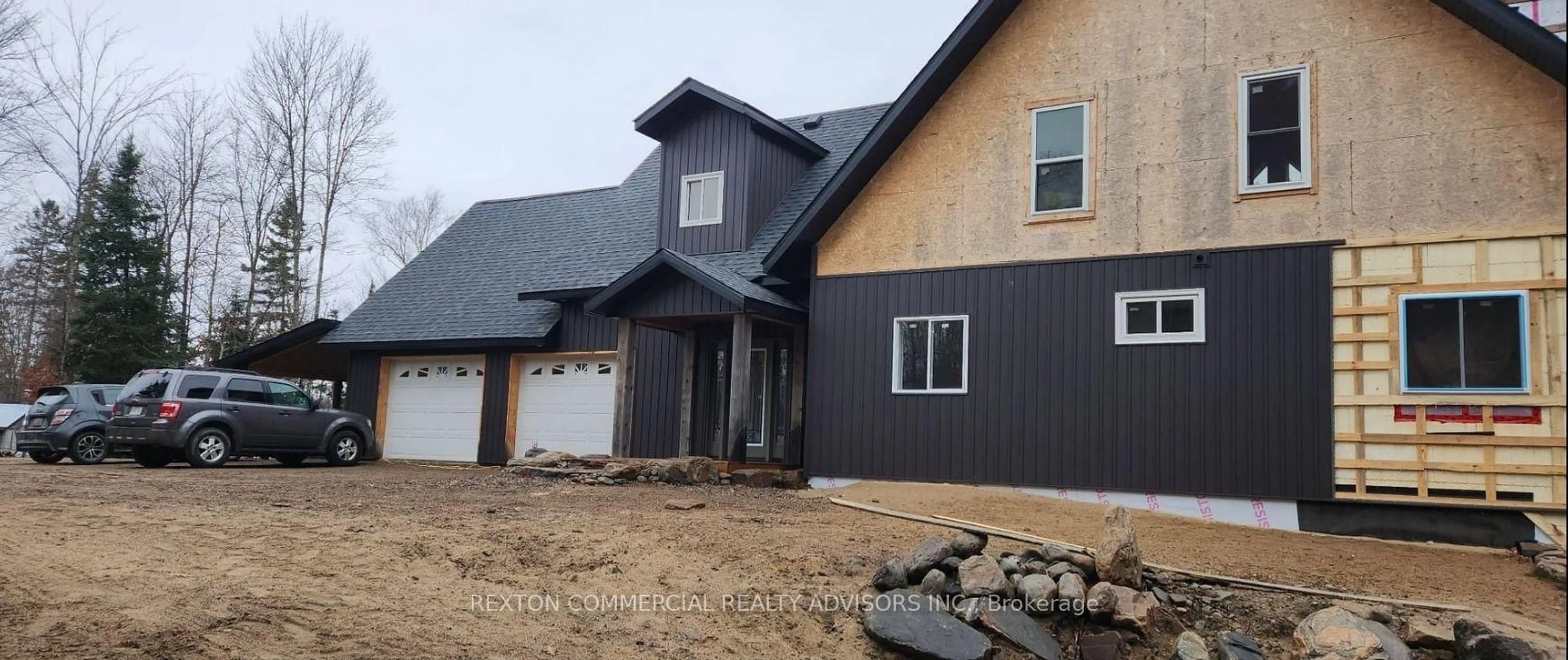 Home with vinyl exterior material, street for 1211 Swan Rd, Minden Hills Ontario K0M 2K0