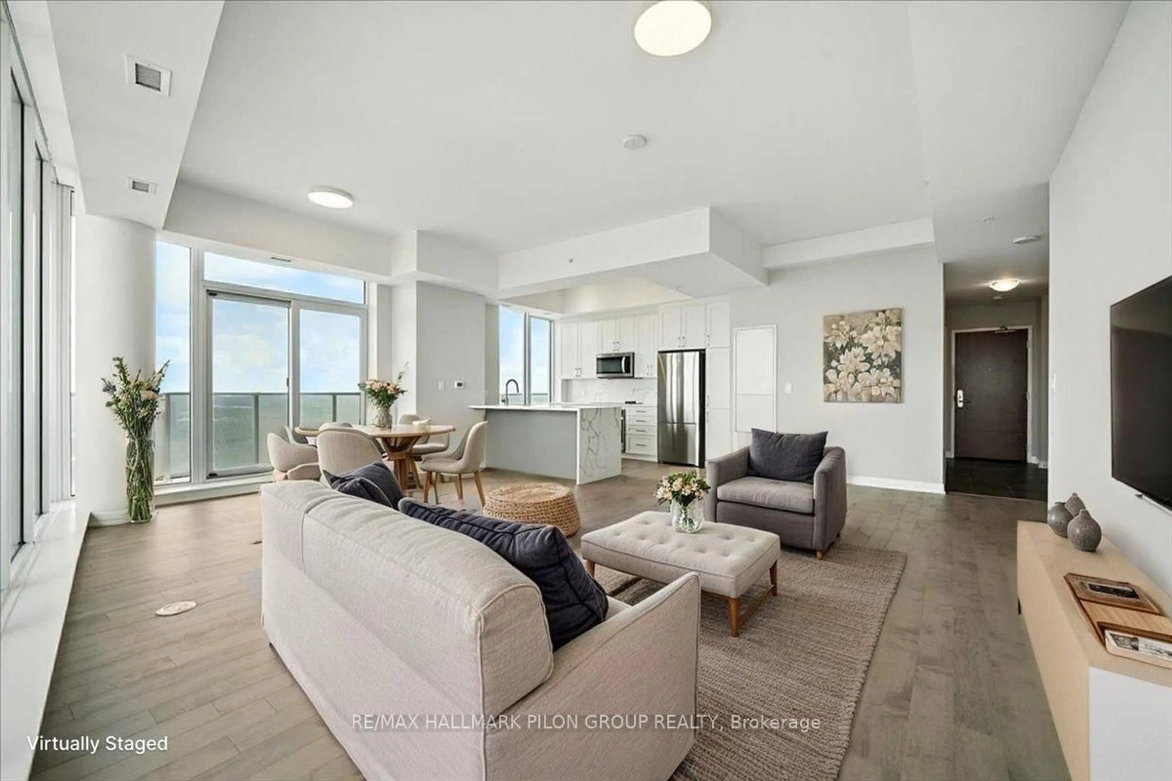 Living room with furniture, unknown for 805 Carling Ave #3907, Ottawa Ontario K1S 5W9