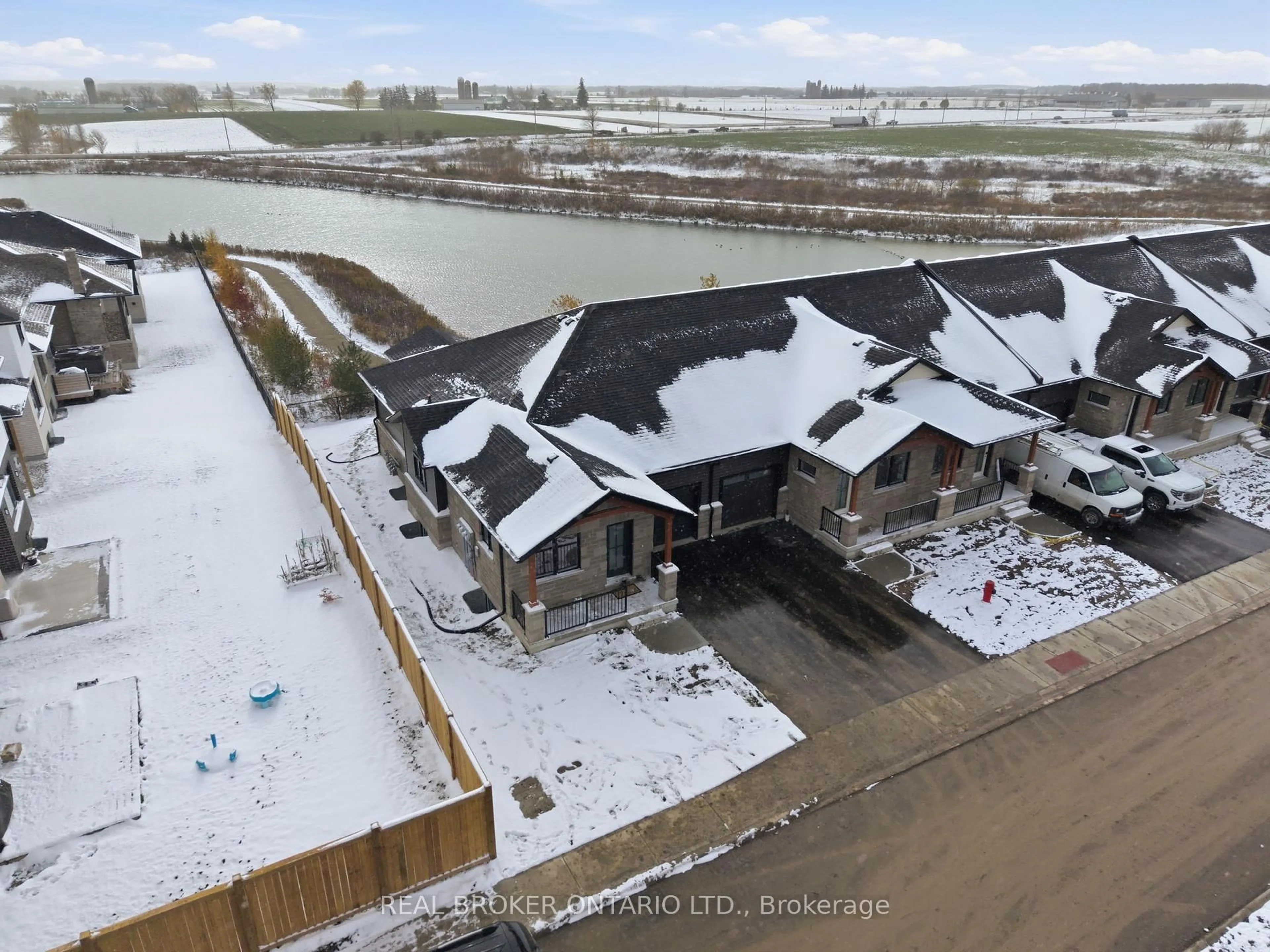 A pic from outside/outdoor area/front of a property/back of a property/a pic from drone, water/lake/river/ocean view for 29 Weymouth St #17, Woolwich Ontario N3B 0G3