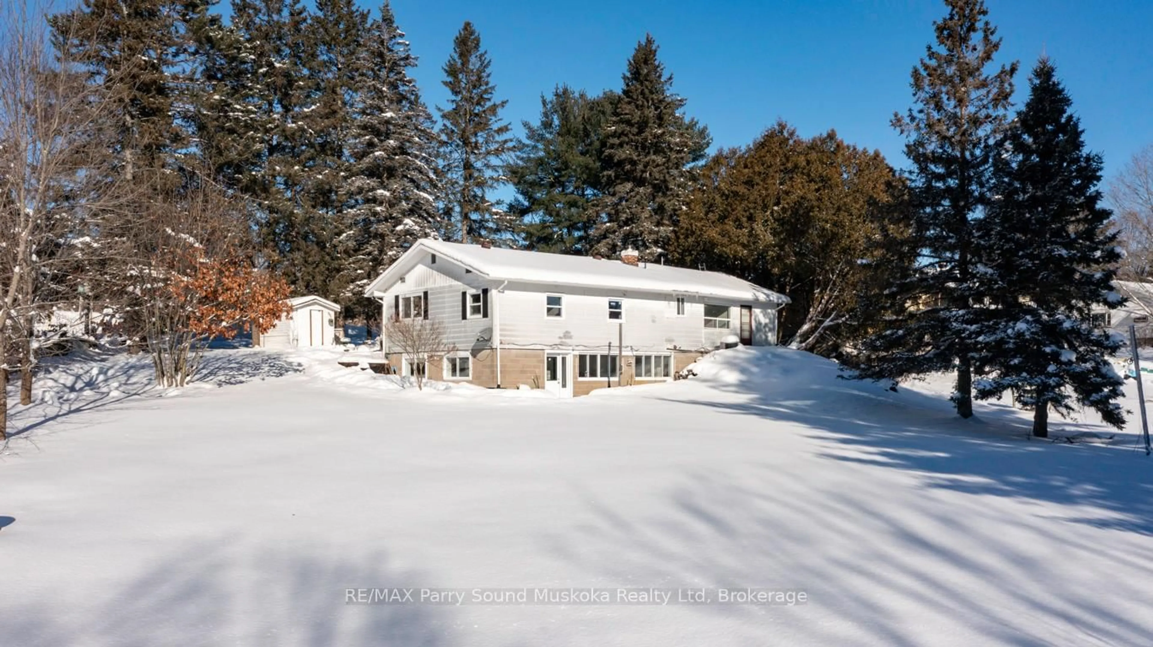 A pic from outside/outdoor area/front of a property/back of a property/a pic from drone, unknown for 53 124 Highway, McDougall Ontario P2A 2W9