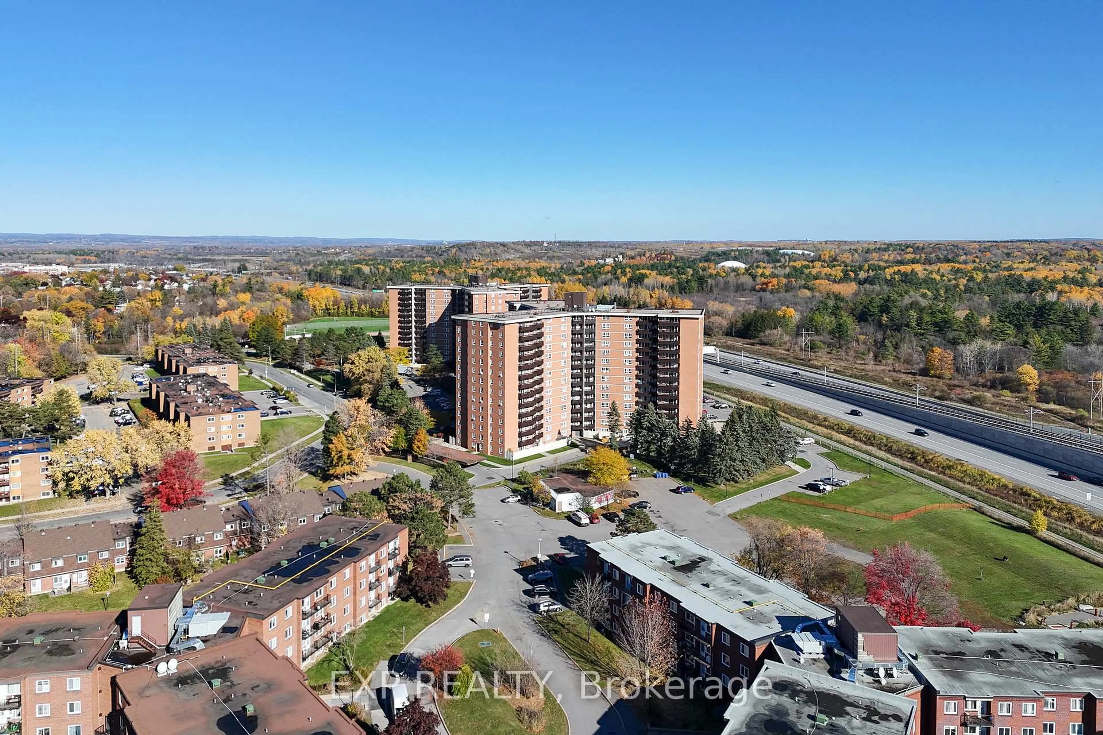 A pic from outside/outdoor area/front of a property/back of a property/a pic from drone, city buildings view from balcony for 2000 Jasmine Cres #415, Ottawa Ontario K1J 8K4