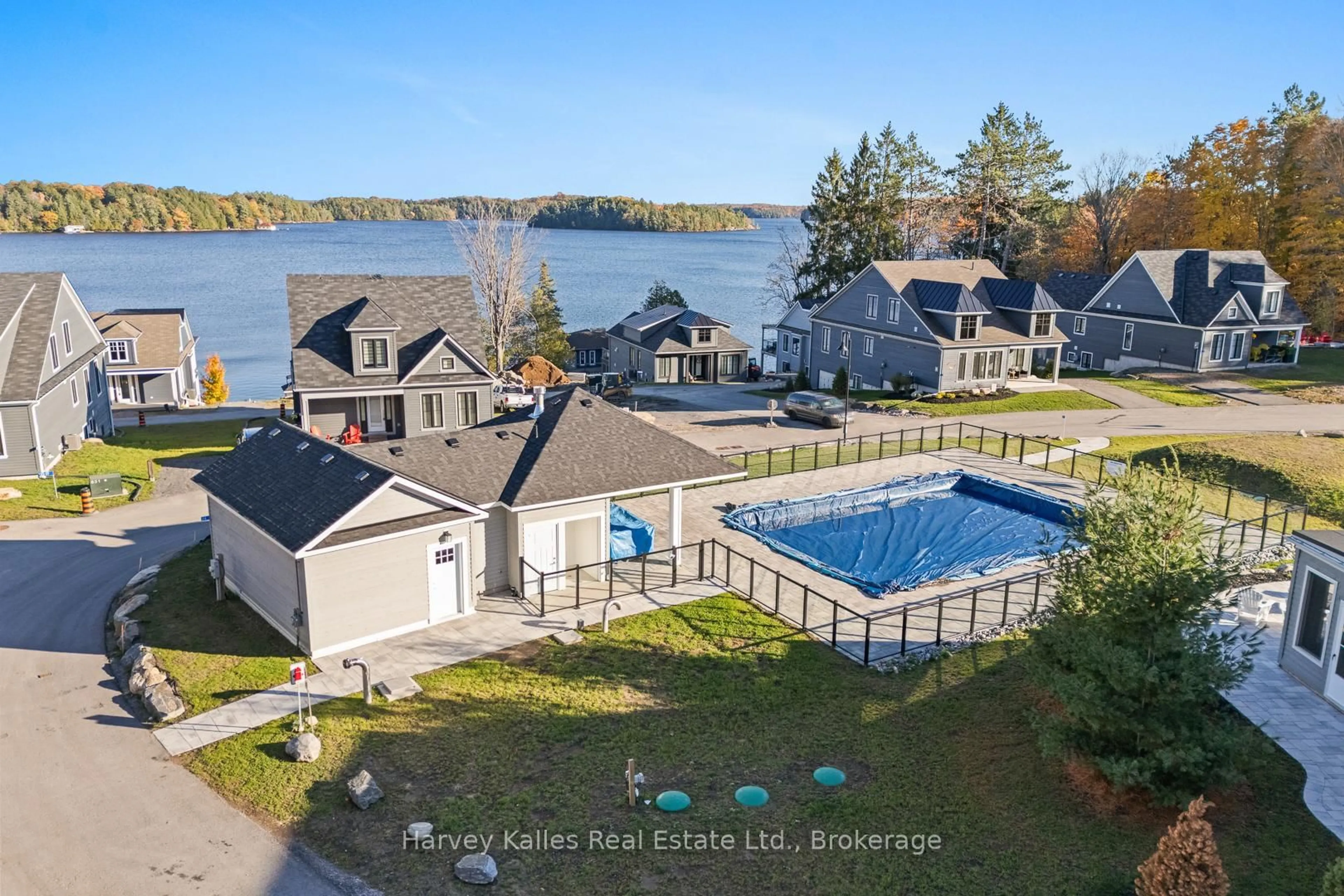 A pic from outside/outdoor area/front of a property/back of a property/a pic from drone, water/lake/river/ocean view for 2054 Peninsula Rd #15, Muskoka Lakes Ontario P0B 1G0