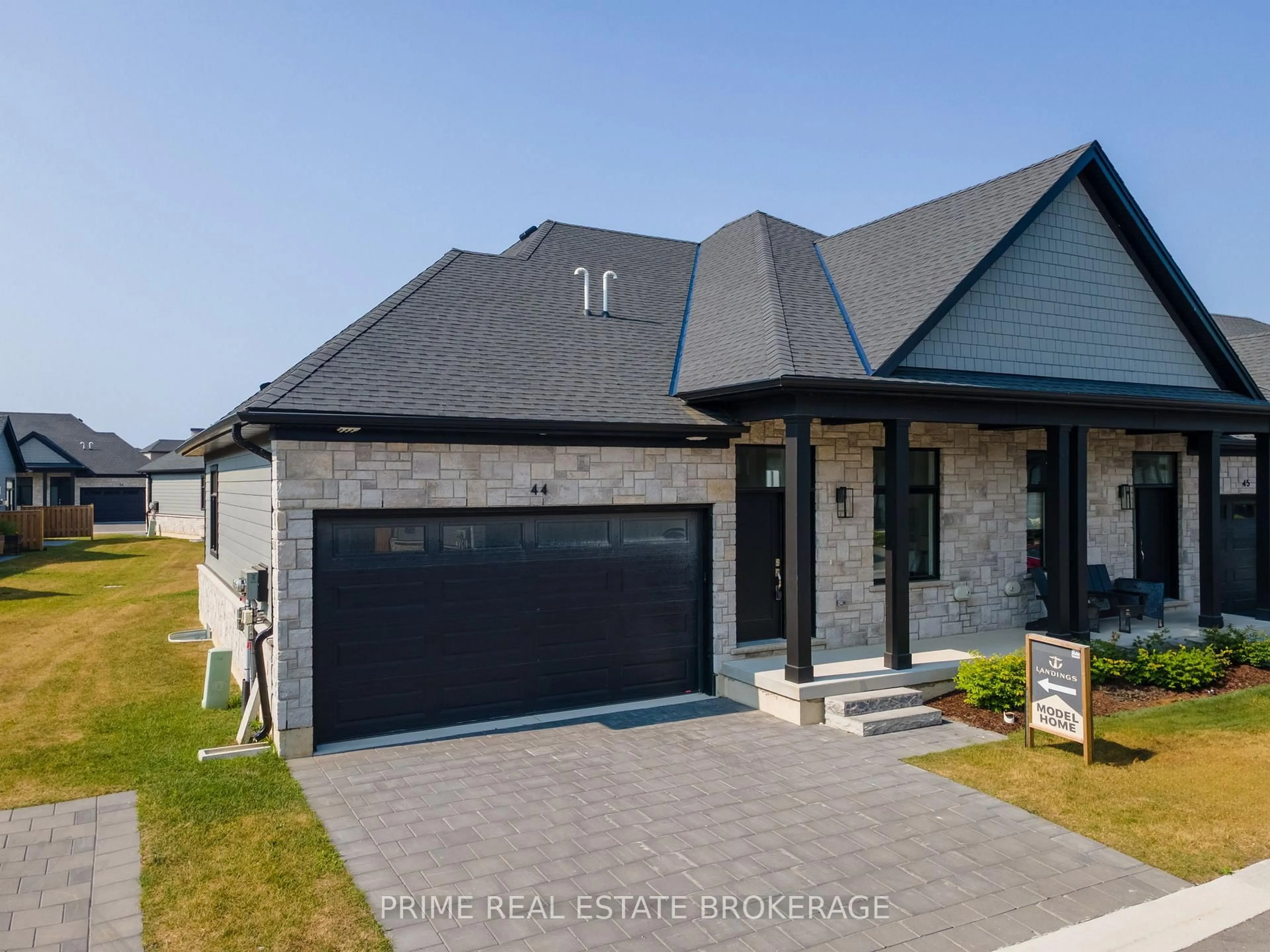 Home with brick exterior material, street for 63 Compass Tr #44, Central Elgin Ontario N5L 0B4