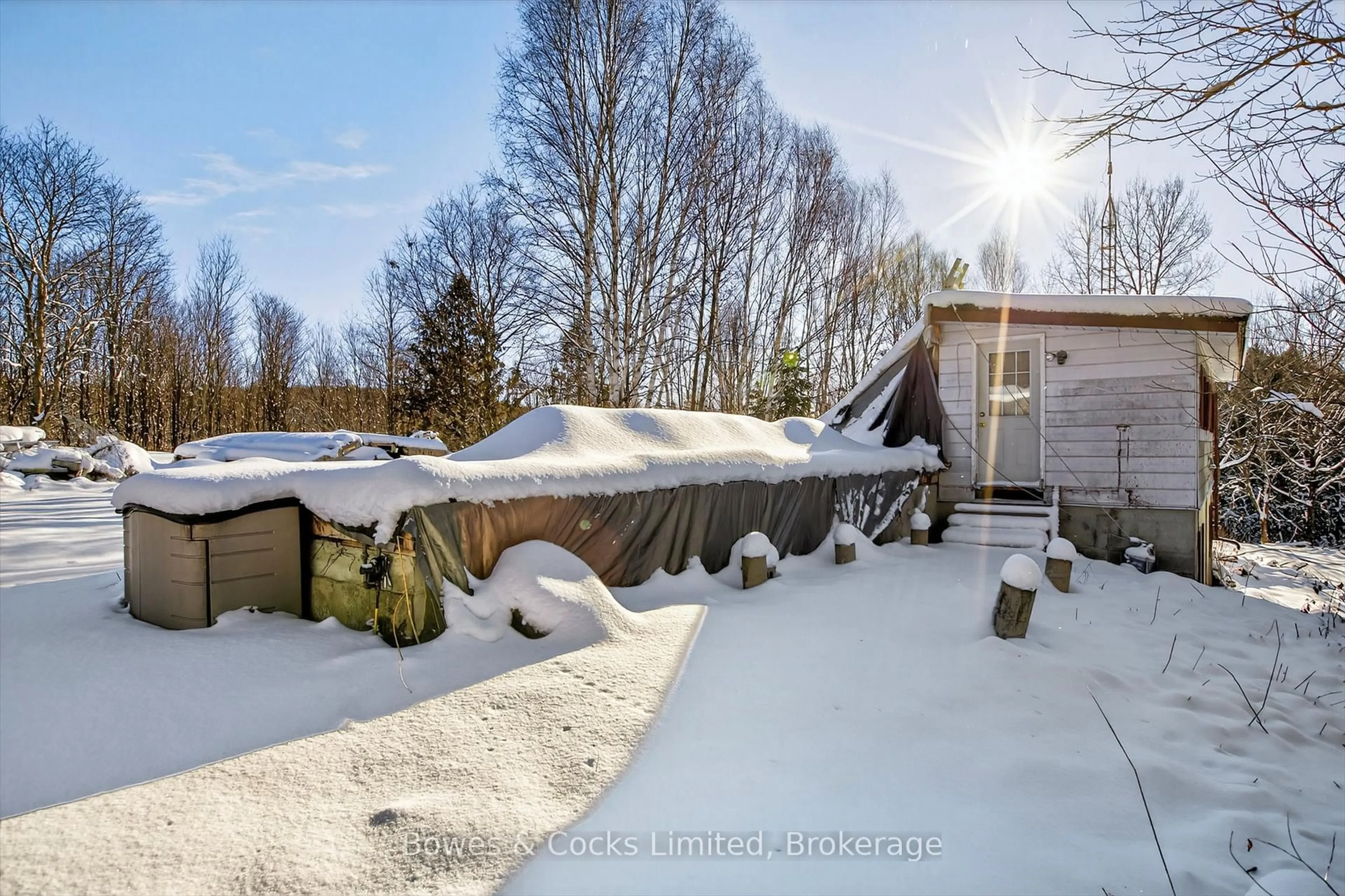 A pic from outside/outdoor area/front of a property/back of a property/a pic from drone, unknown for 1350 Madill Rd, Highlands East Ontario K0L 2Y0