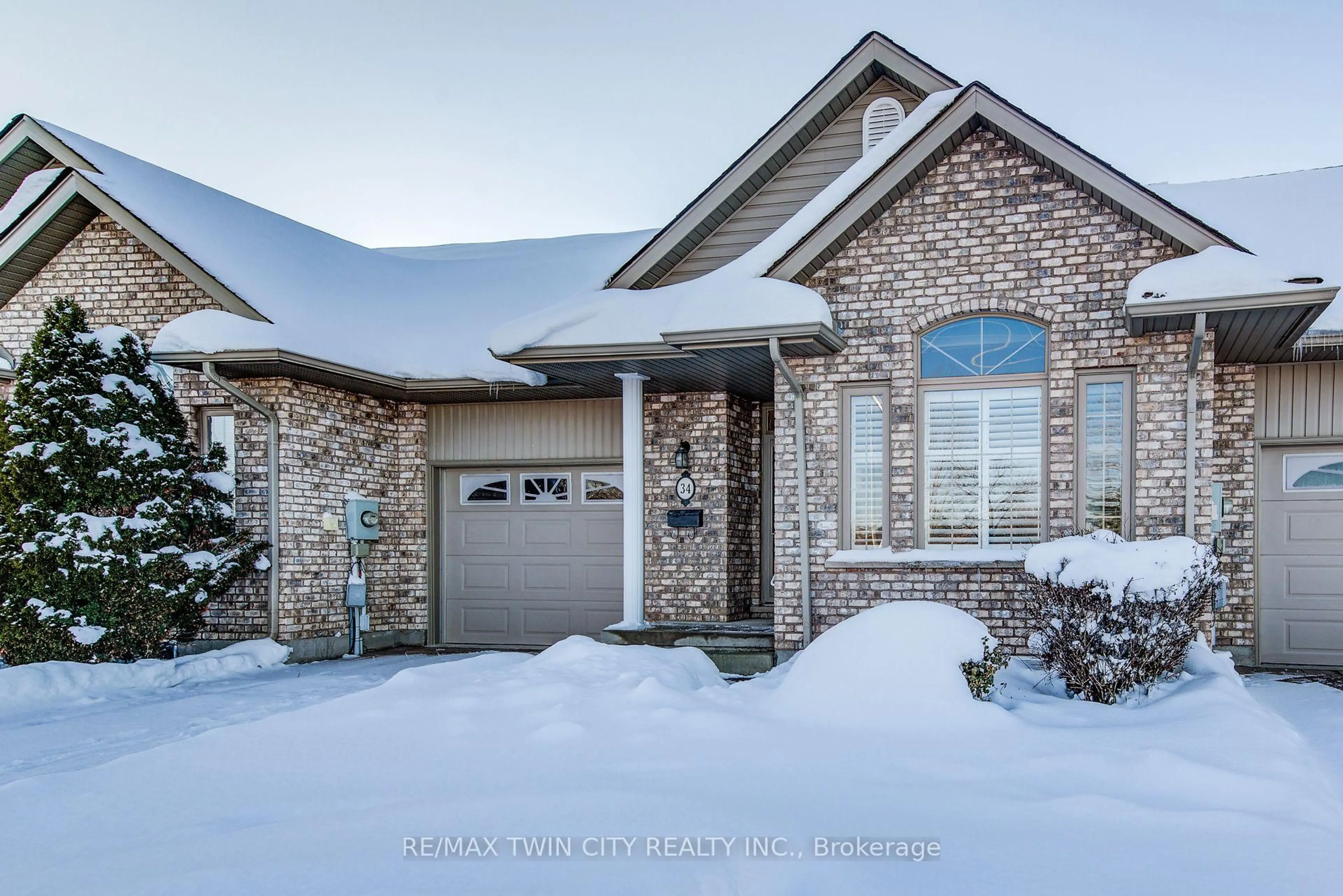 Home with brick exterior material, street for 34 Livingston Blvd #15, Wilmot Ontario N3A 4M7