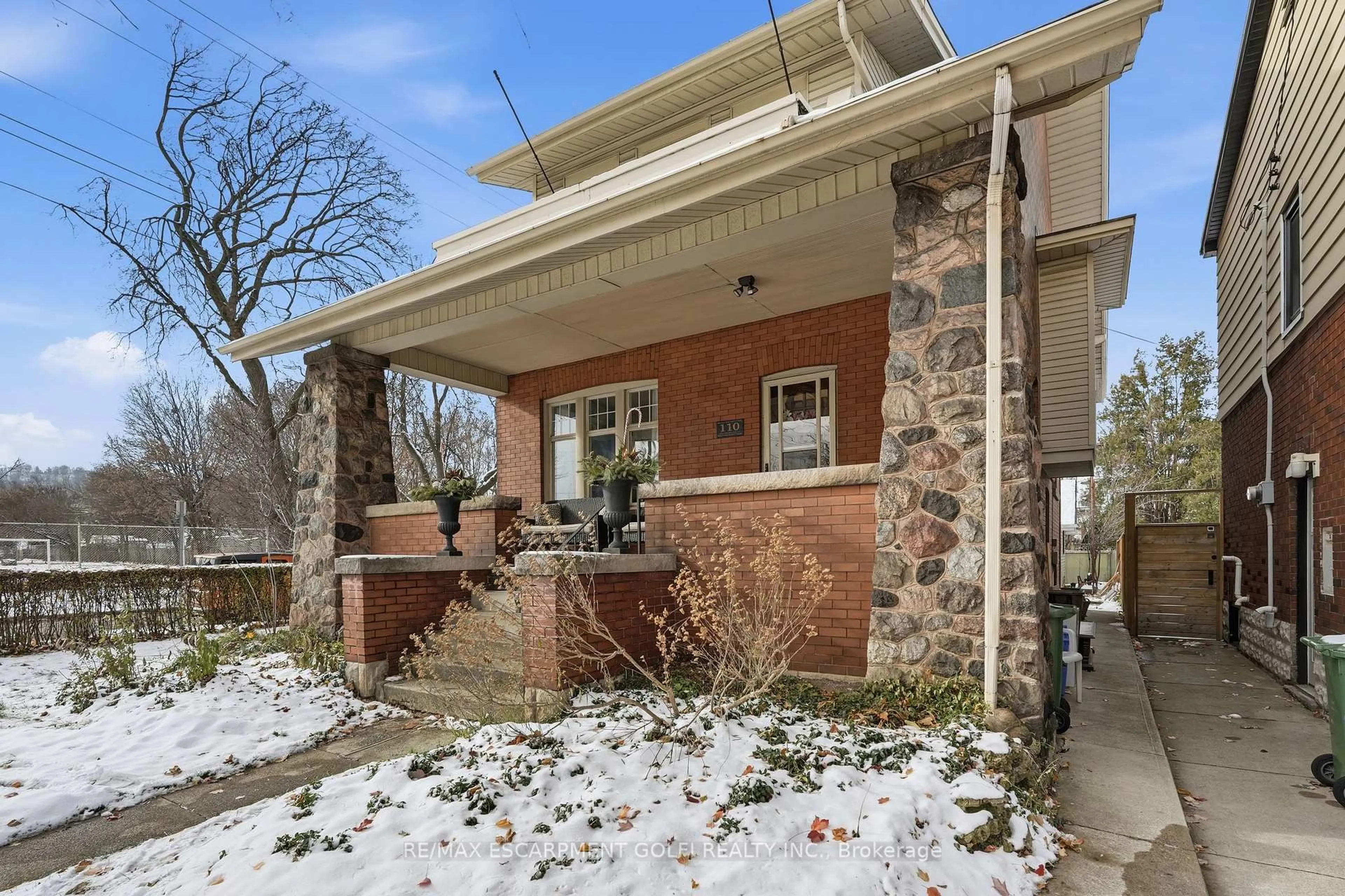 Home with brick exterior material, street for 110 Houghton Ave, Hamilton Ontario L8K 2M8