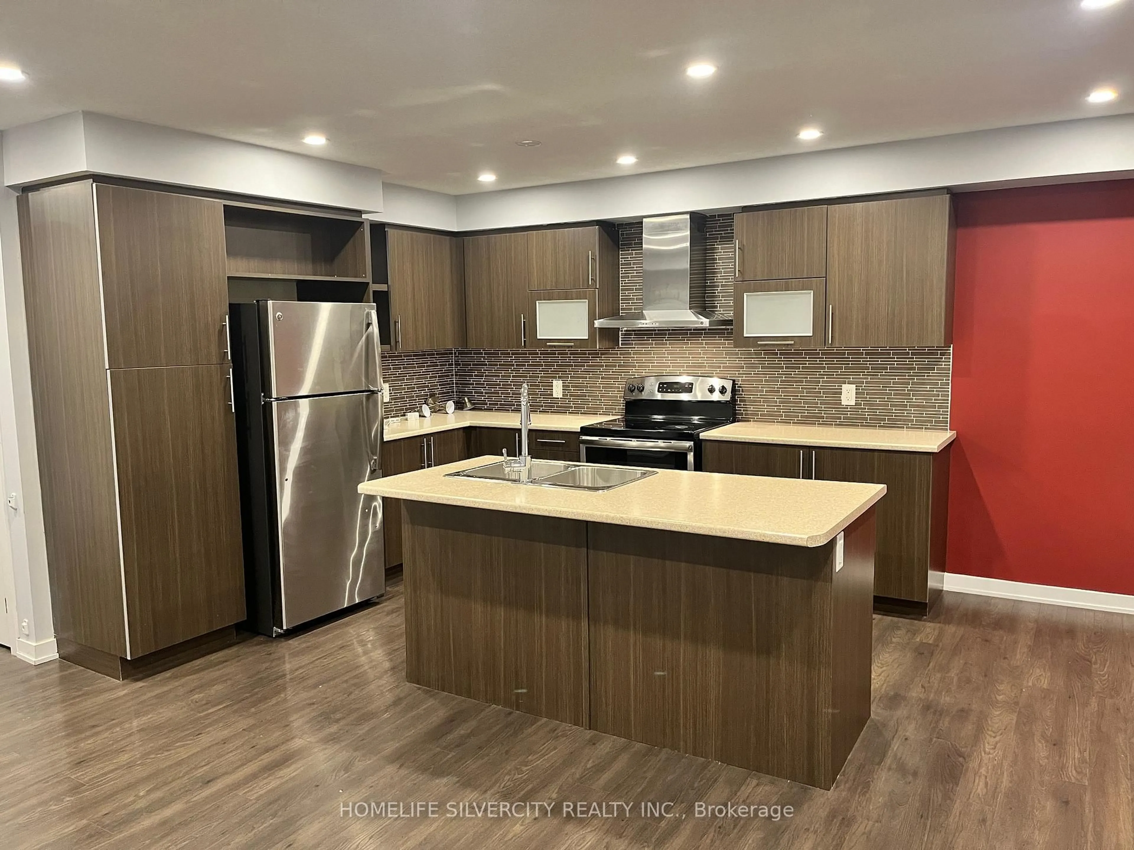 Open concept kitchen, wood/laminate floor for 98 Crafter Cres, Hamilton Ontario L8J 2V5