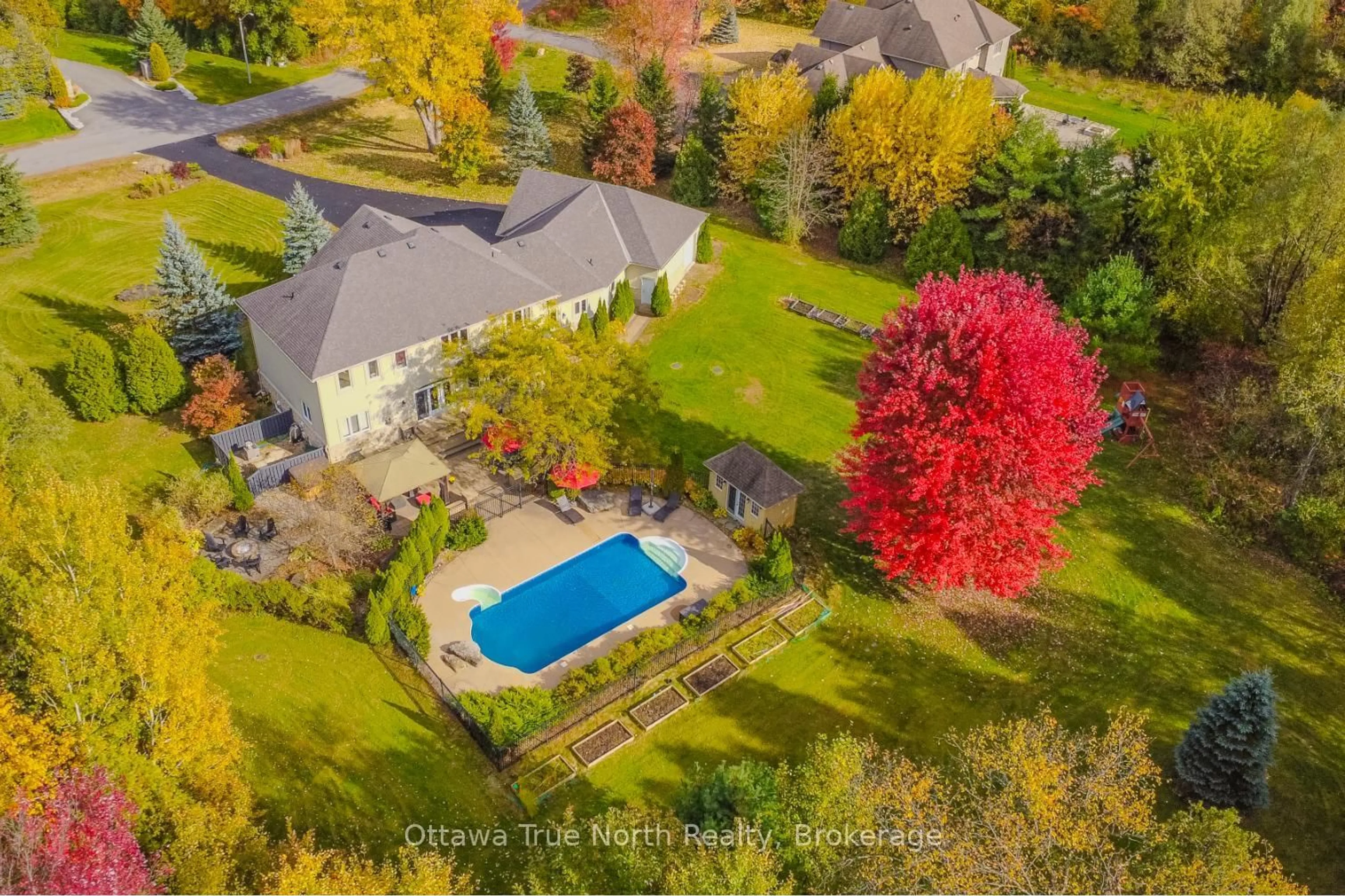 A pic from outside/outdoor area/front of a property/back of a property/a pic from drone, water/lake/river/ocean view for 1530 Lords Manor Lane, Ottawa Ontario K4M 1K3