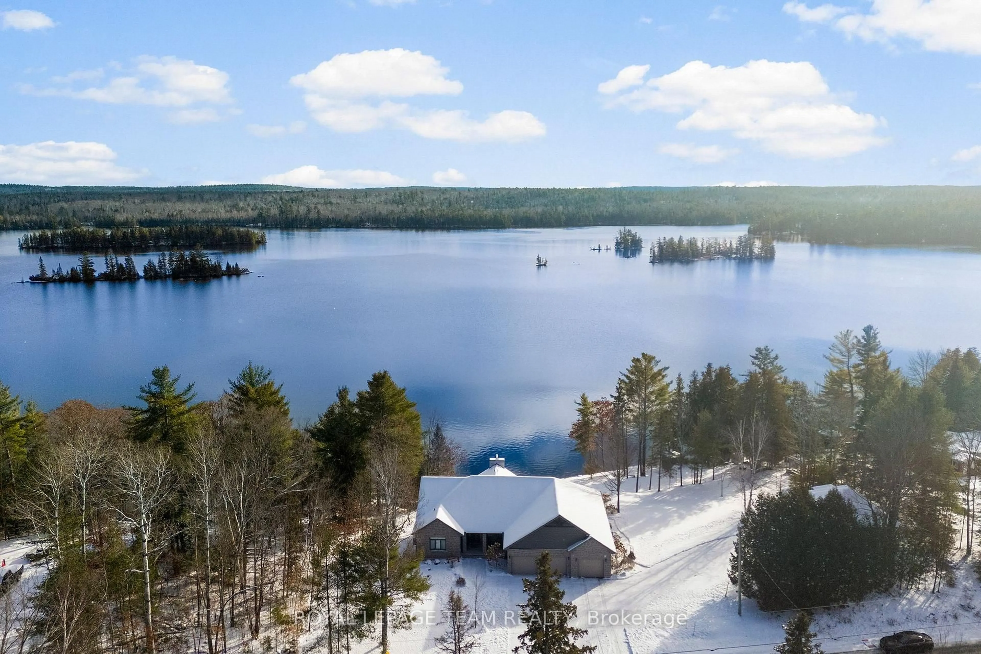 A pic from outside/outdoor area/front of a property/back of a property/a pic from drone, water/lake/river/ocean view for 2803 Centennial Lake Rd, Calabogie Ontario K0J 1H0