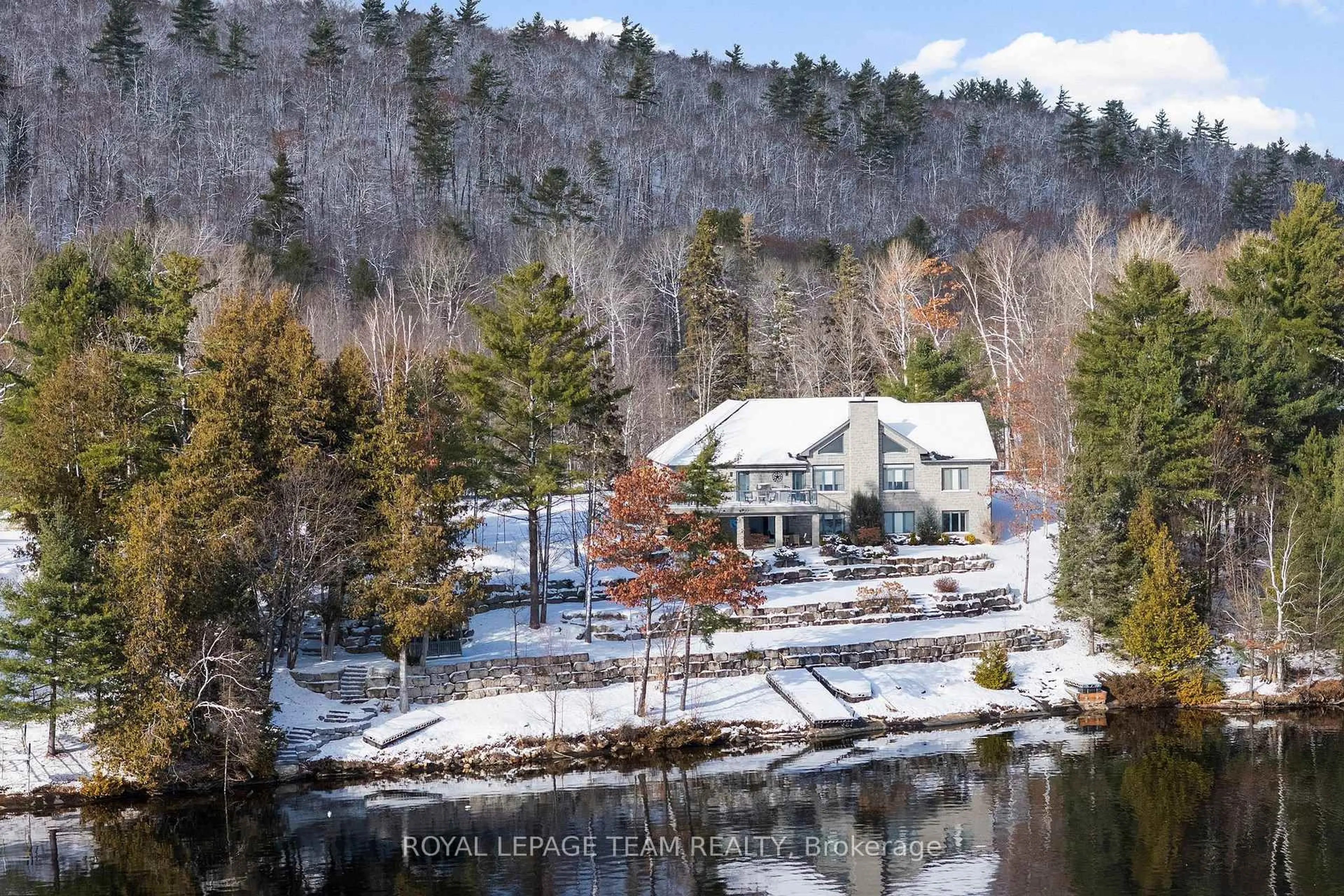 A pic from outside/outdoor area/front of a property/back of a property/a pic from drone, water/lake/river/ocean view for 2803 Centennial Lake Rd, Calabogie Ontario K0J 1H0
