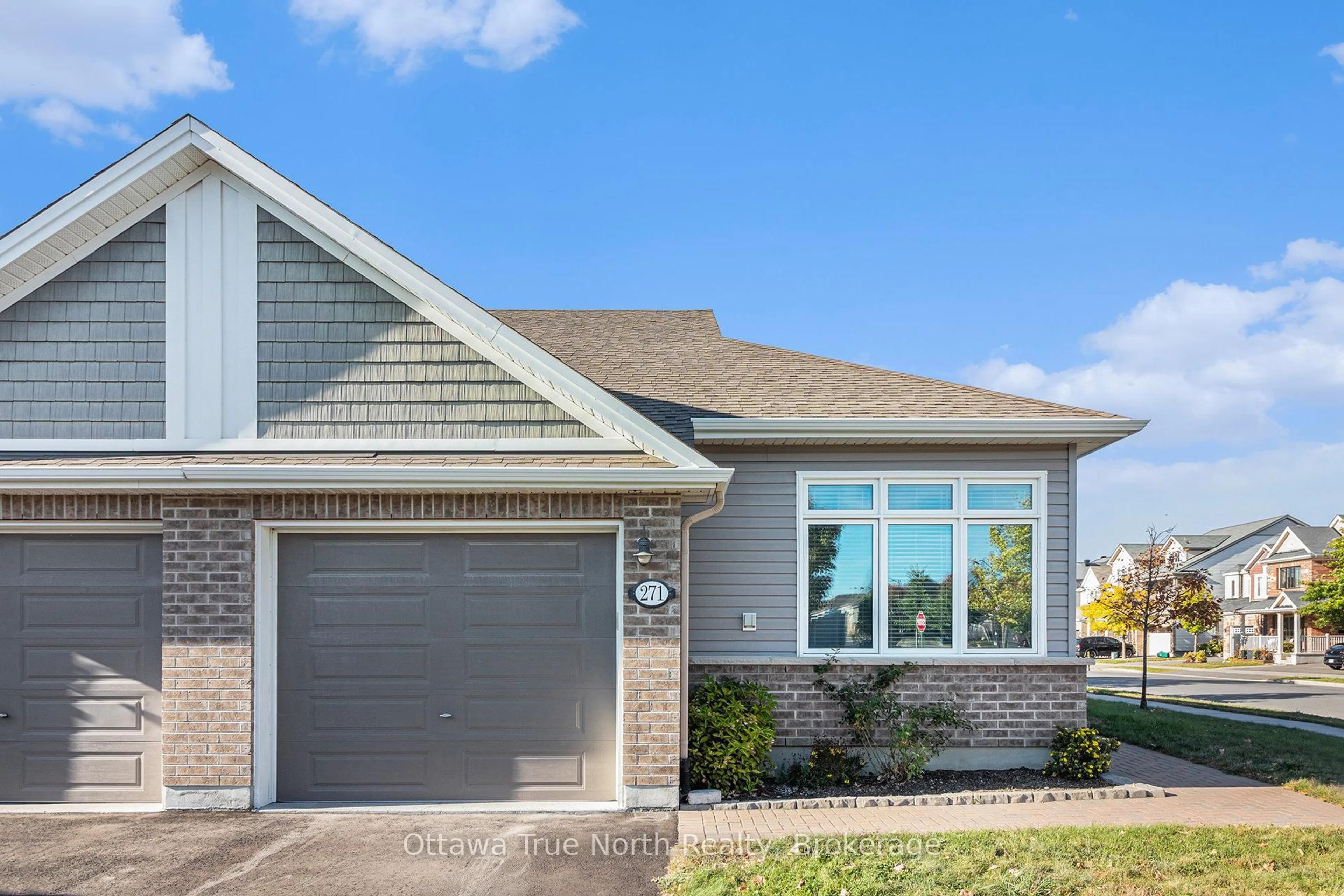 Home with vinyl exterior material, street for 271 Brambling Way, Ottawa Ontario K2J 0E4