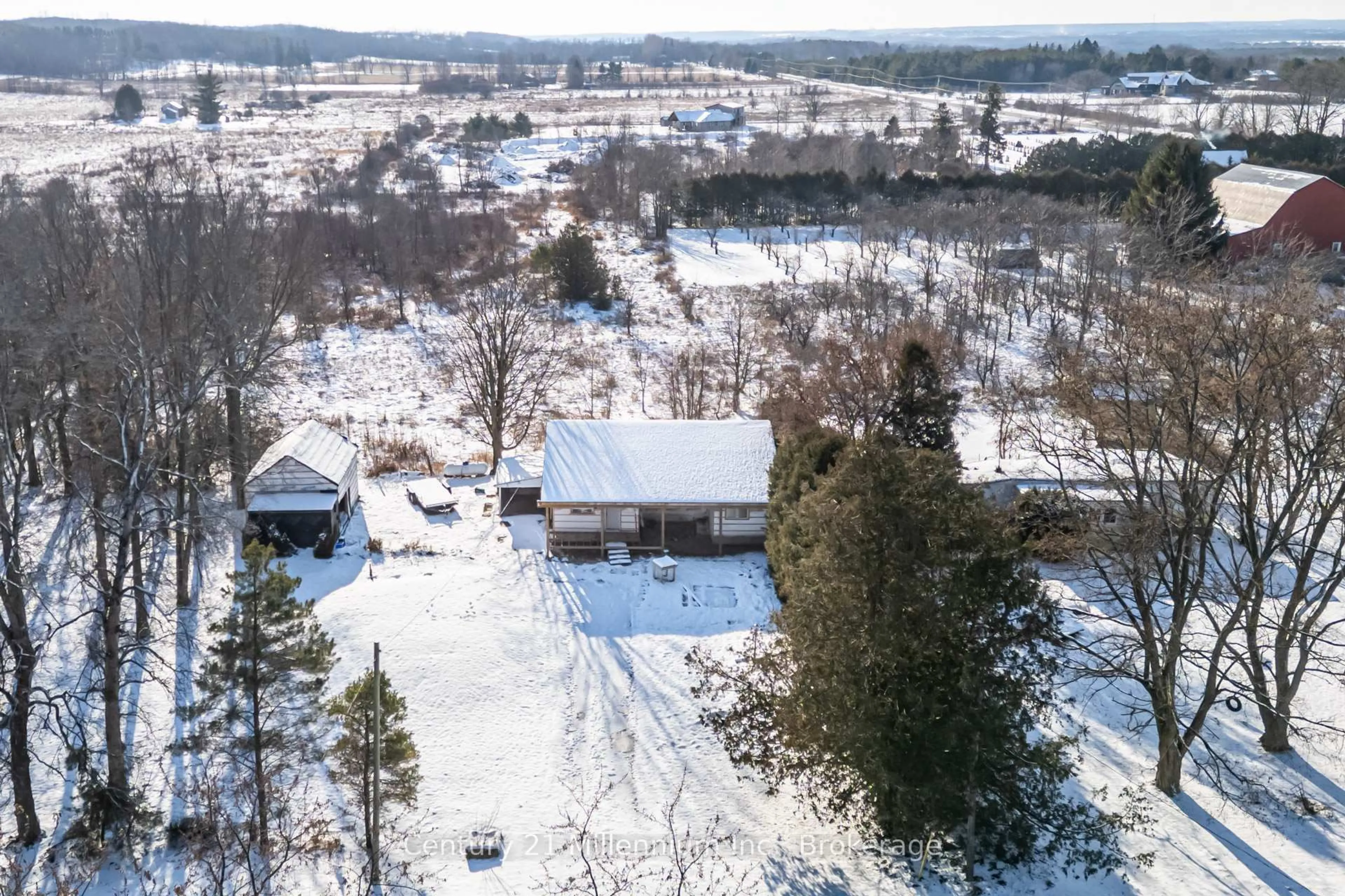 A pic from outside/outdoor area/front of a property/back of a property/a pic from drone, unknown for 303240 33 Sdrd, Meaford Ontario N0H 1B0