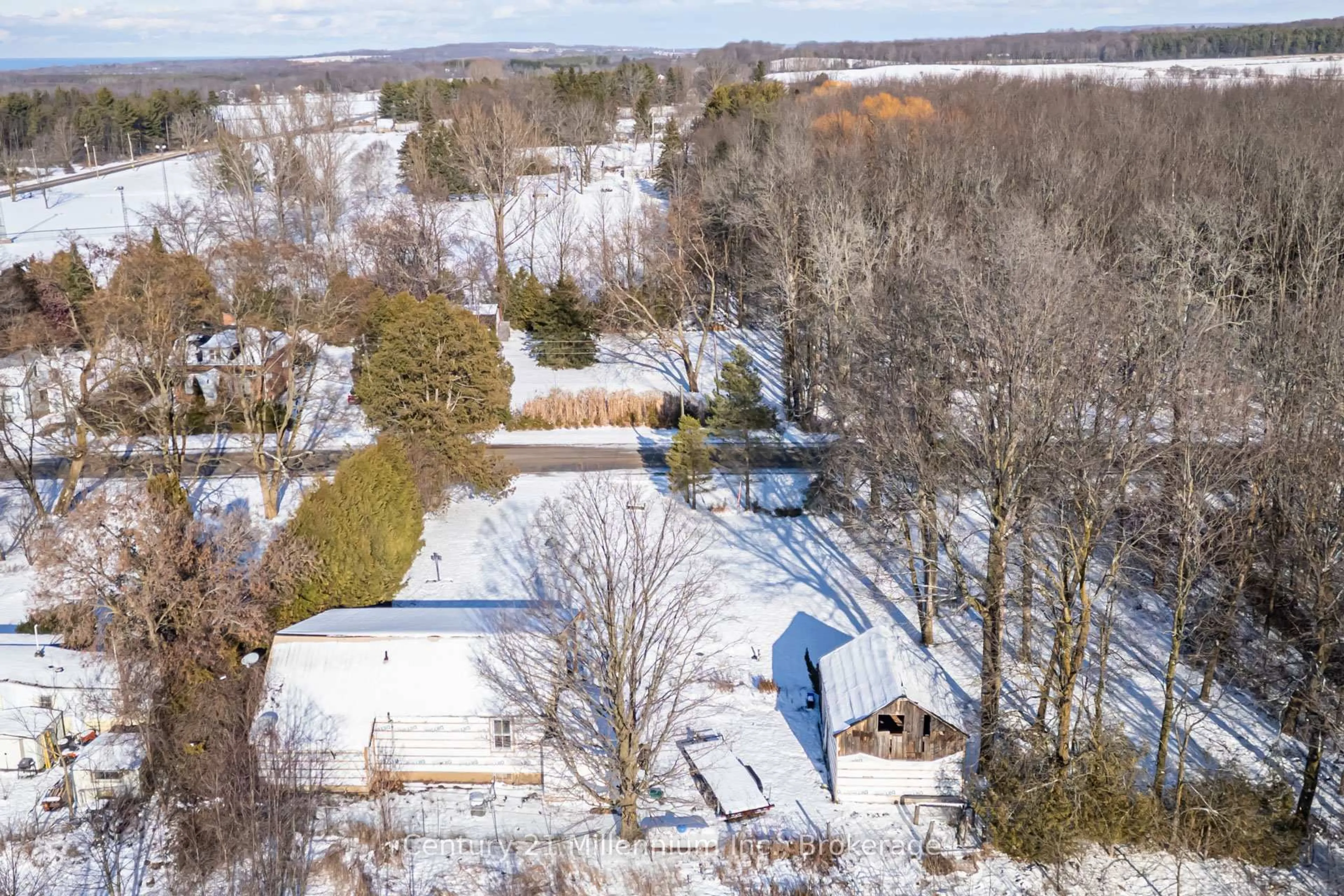 A pic from outside/outdoor area/front of a property/back of a property/a pic from drone, water/lake/river/ocean view for 303240 33 Sdrd, Meaford Ontario N0H 1B0