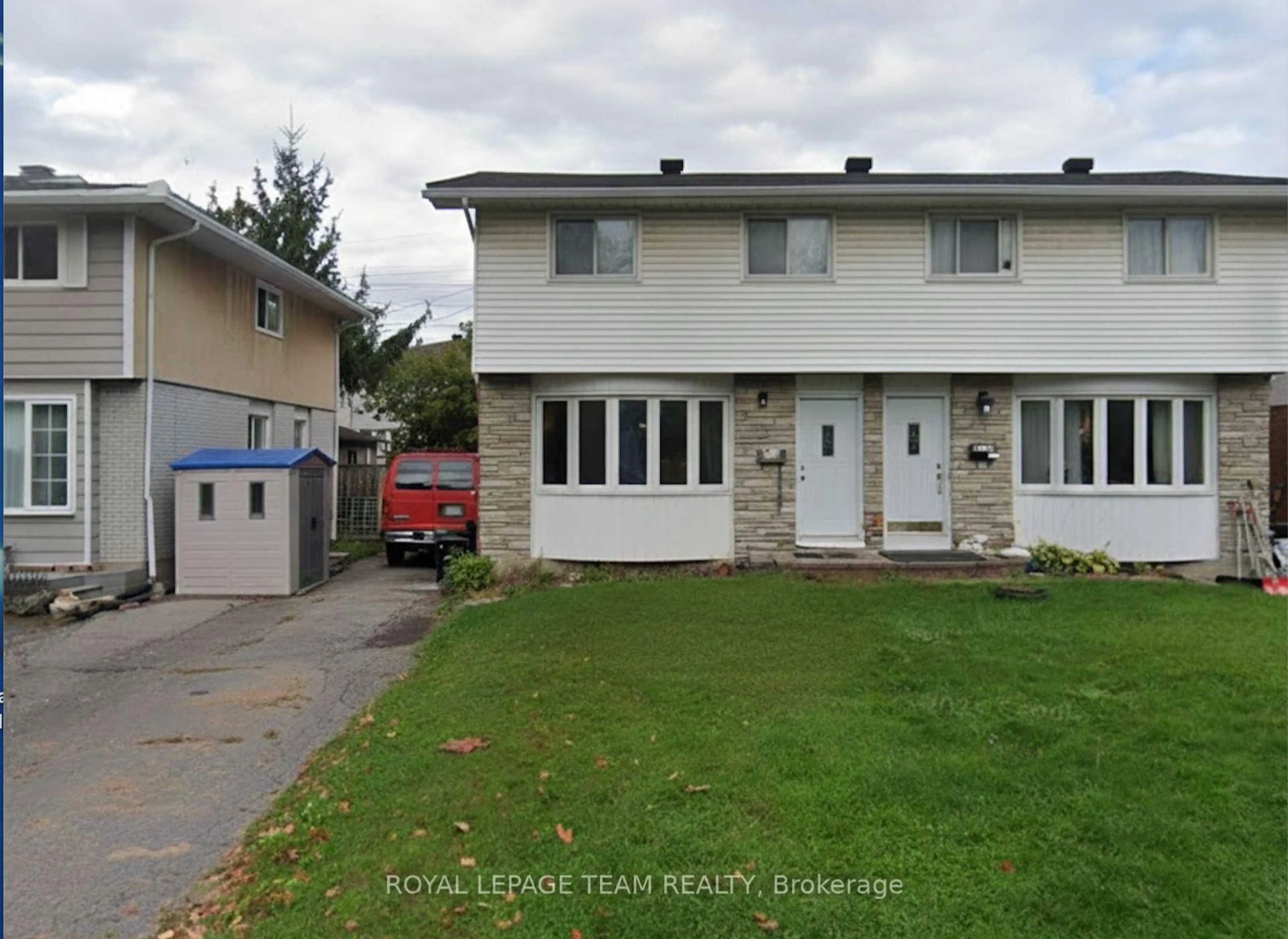 A pic from outside/outdoor area/front of a property/back of a property/a pic from drone, street for 973 Eiffel Ave, Ottawa Ontario K2C 0J3