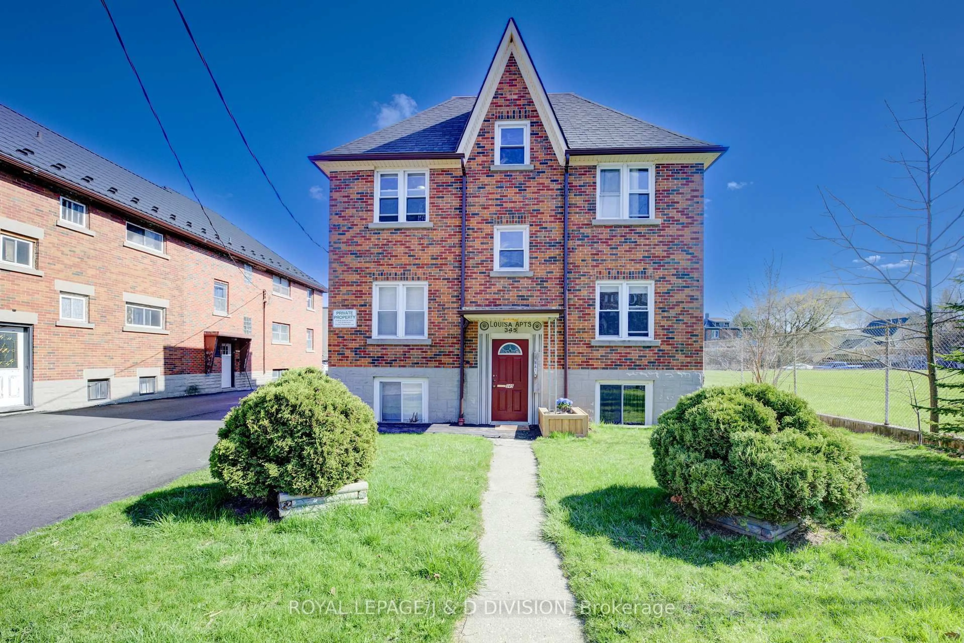 Home with brick exterior material, street for 345 Louisa St, Kitchener Ontario N2H 5N1