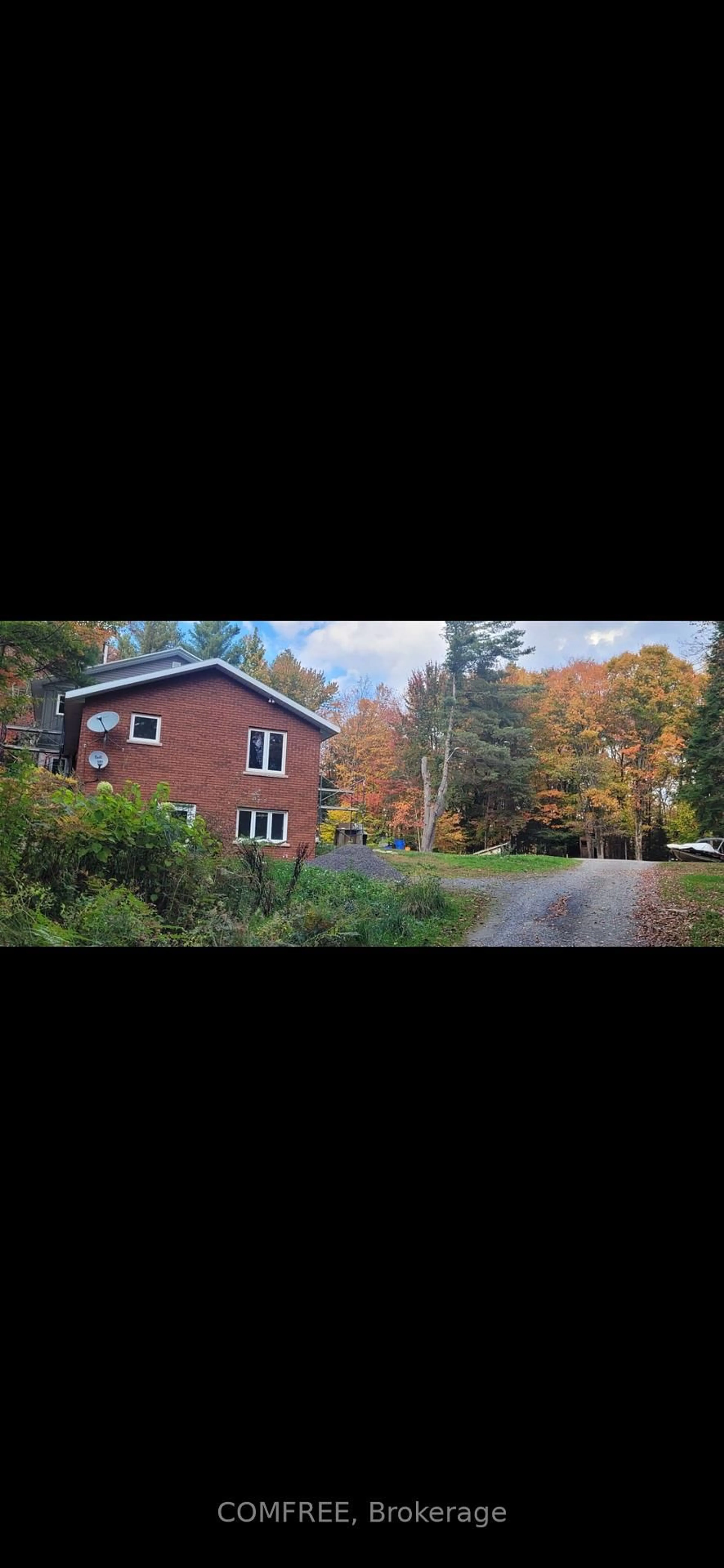 A pic from outside/outdoor area/front of a property/back of a property/a pic from drone, unknown for 39 Raymond Rd, Bracebridge Ontario P1L 1X4