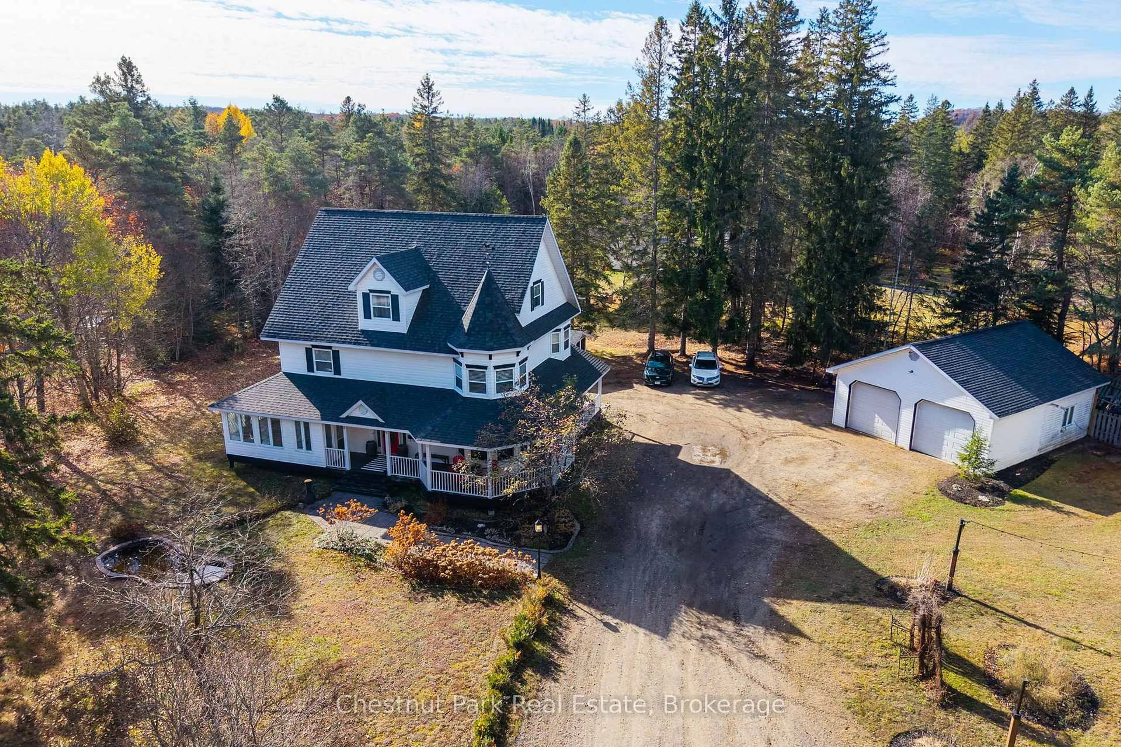 A pic from outside/outdoor area/front of a property/back of a property/a pic from drone, unknown for 75 Pond Cres, Huntsville Ontario P0A 1R0