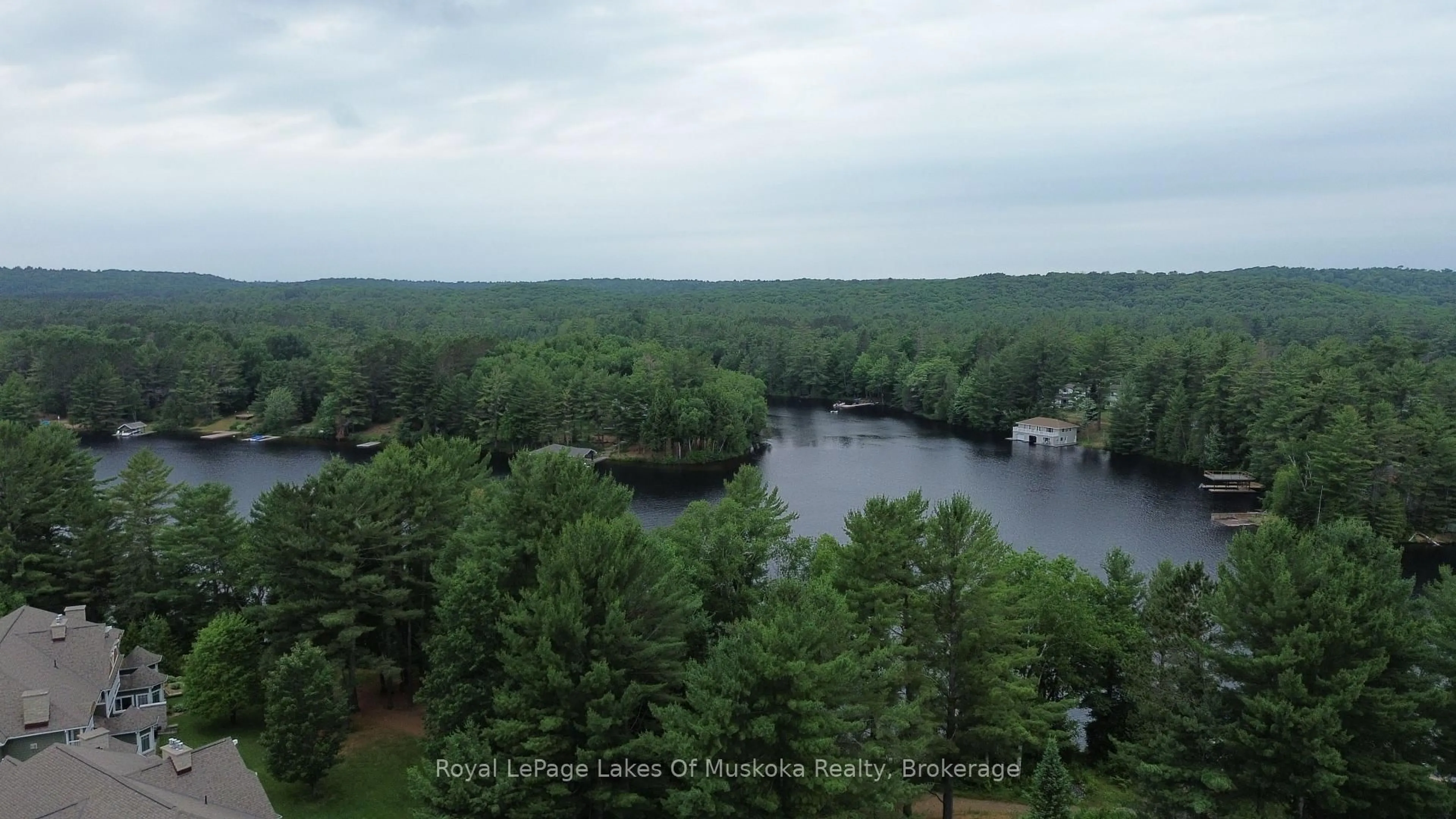 A pic from outside/outdoor area/front of a property/back of a property/a pic from drone, water/lake/river/ocean view for 1020 Birch Glen Rd #V 16 w 3, Lake of Bays Ontario P0B 1A0