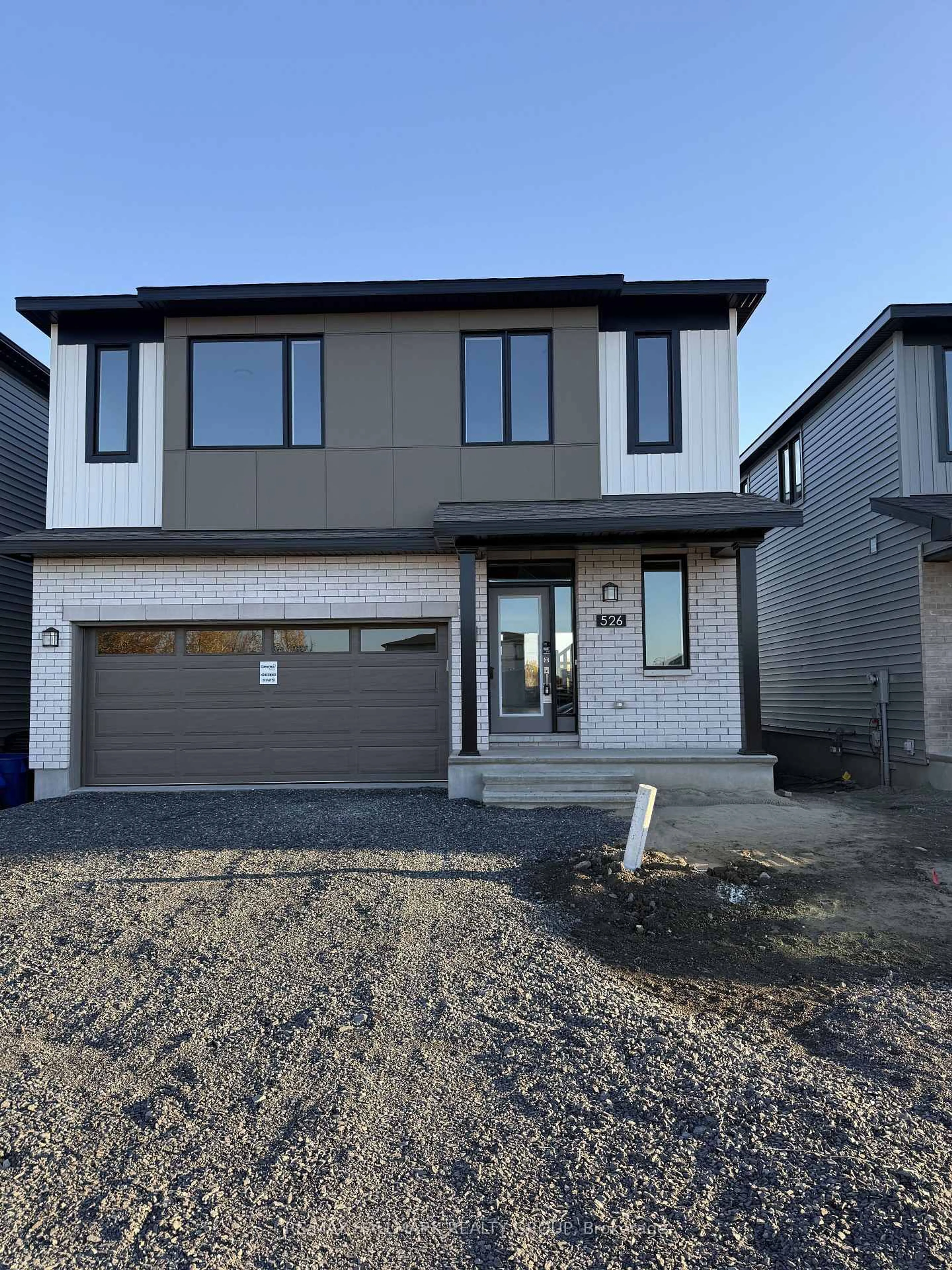 Home with brick exterior material, street for 526 Reflection St, Orleans Ontario K1W 0S8