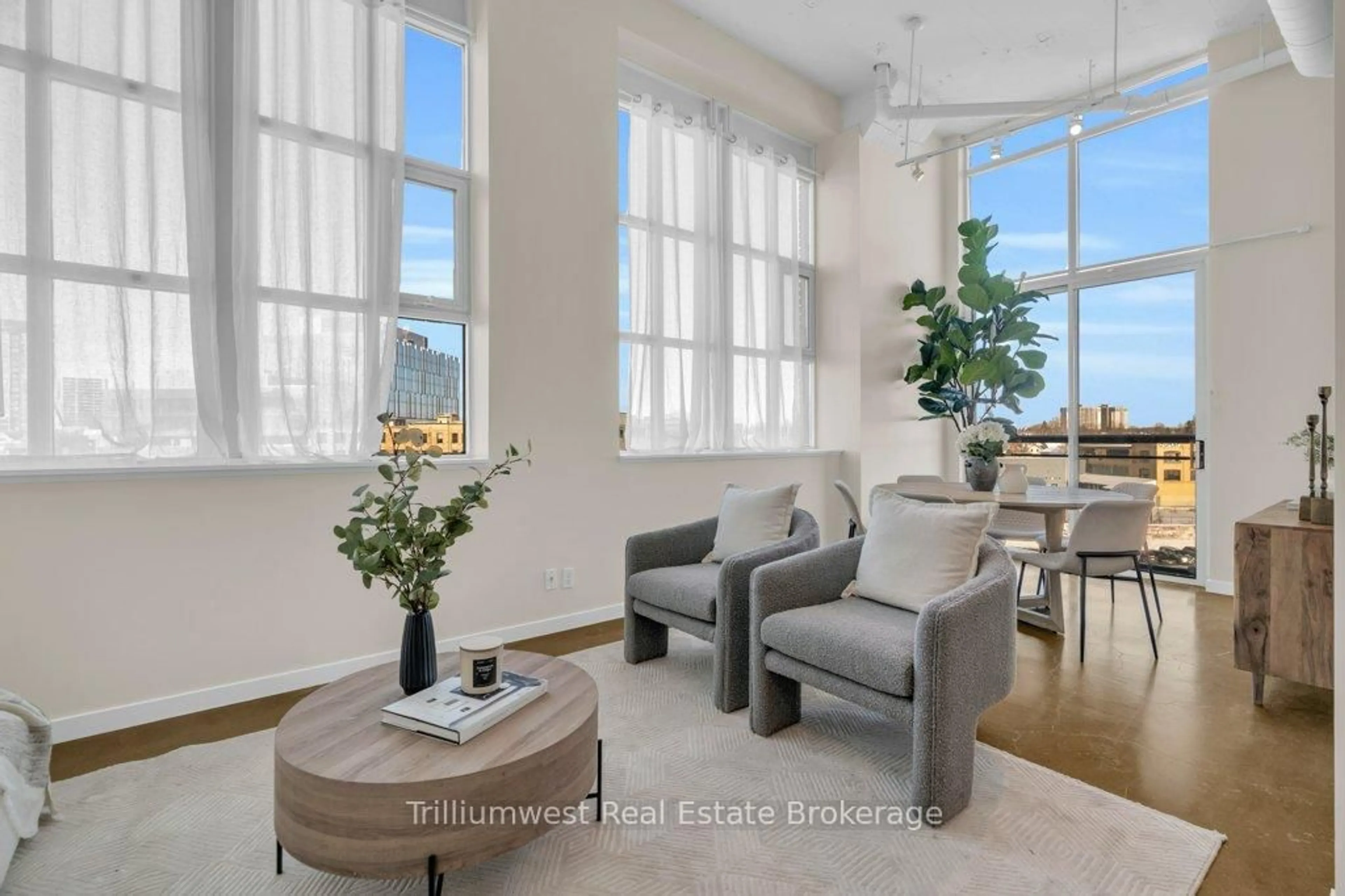 Living room with furniture, unknown for 410 King St #524, Kitchener Ontario N2G 1C3