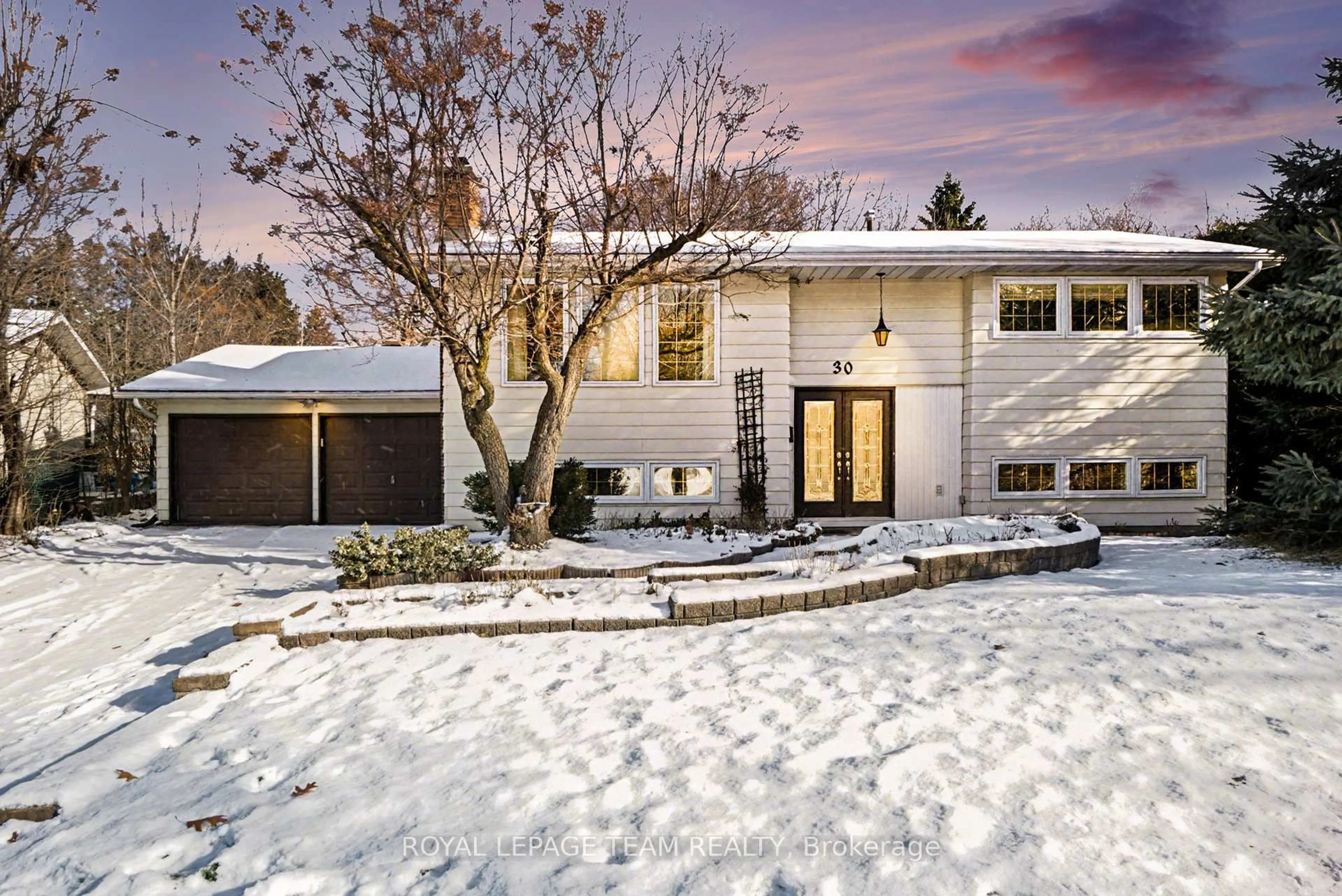 Home with brick exterior material, street for 30 Juniper Crt, Ottawa Ontario K2E 5M6