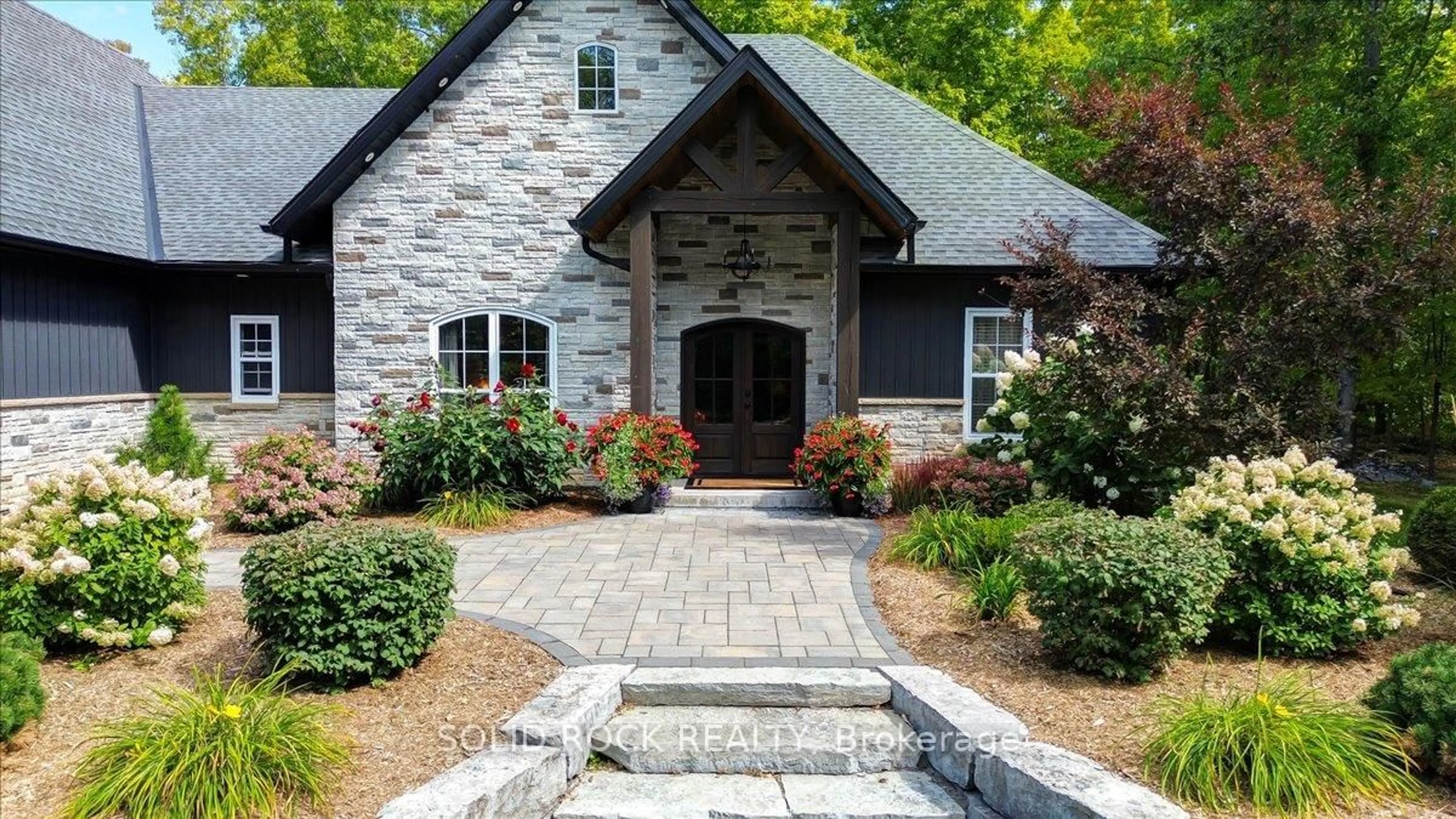 Home with brick exterior material, street for 400 Pigden Rd, Madoc Ontario K0K 2K0