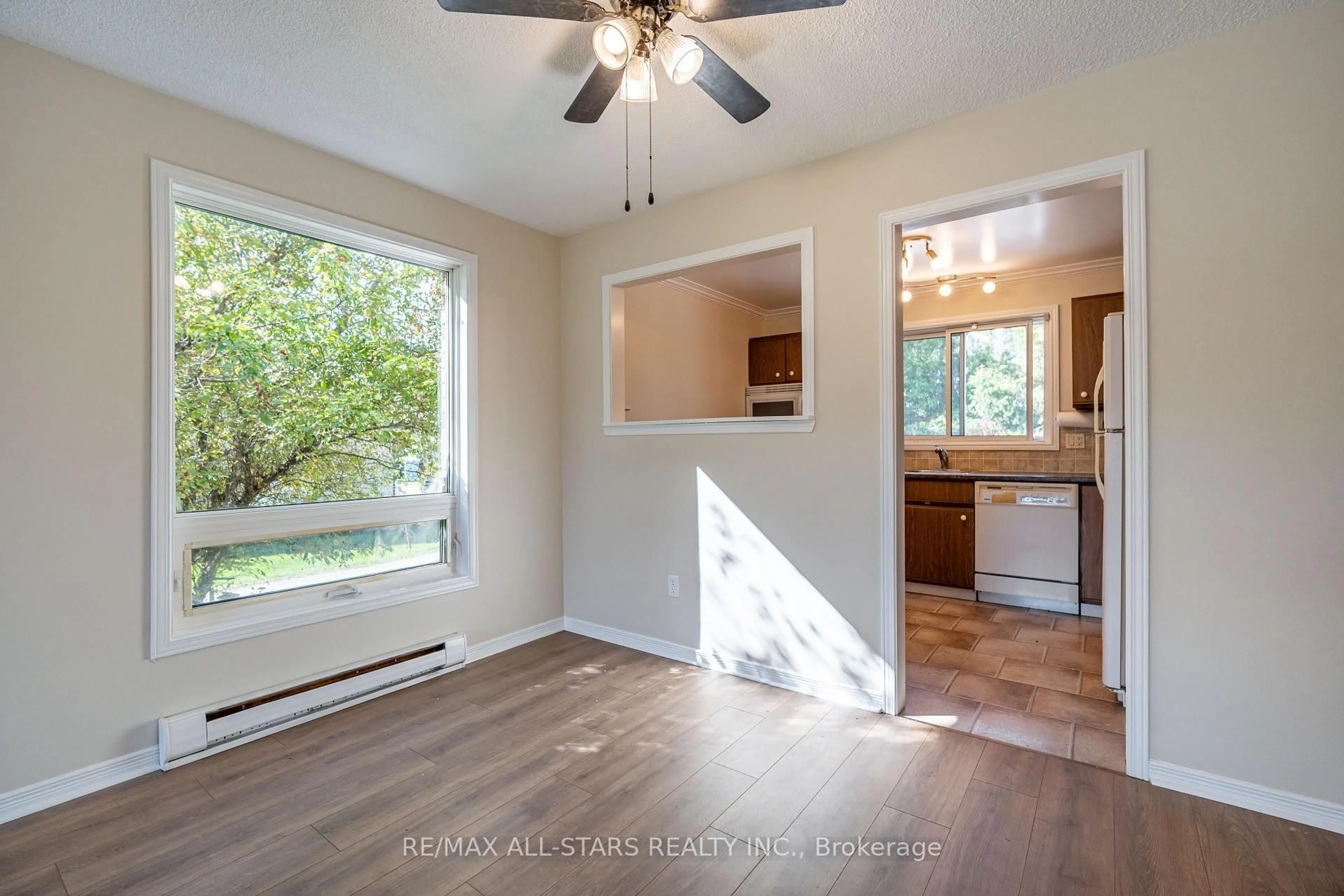 Open concept kitchen, wood/laminate floor for 103 D Rita Cres, Kawartha Lakes Ontario K0L 2W0