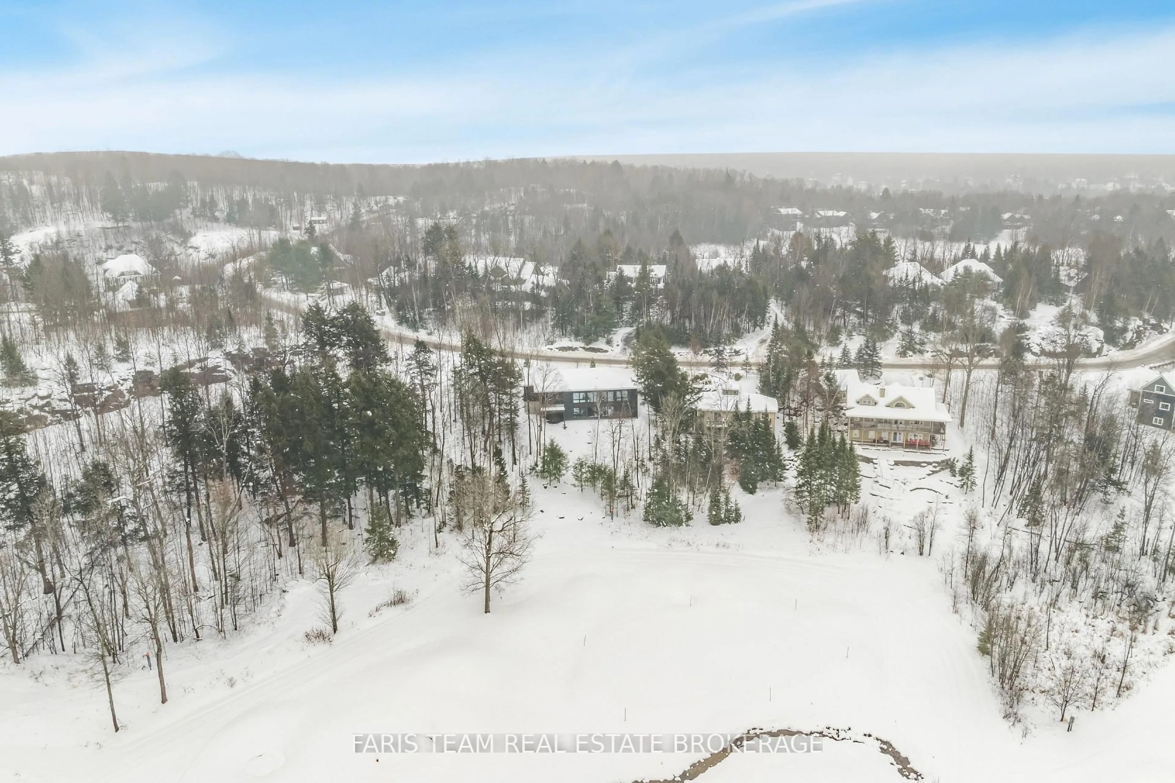 A pic from outside/outdoor area/front of a property/back of a property/a pic from drone, mountain view for Lot 1 St Andrews Circ, Huntsville Ontario P1H 1B1