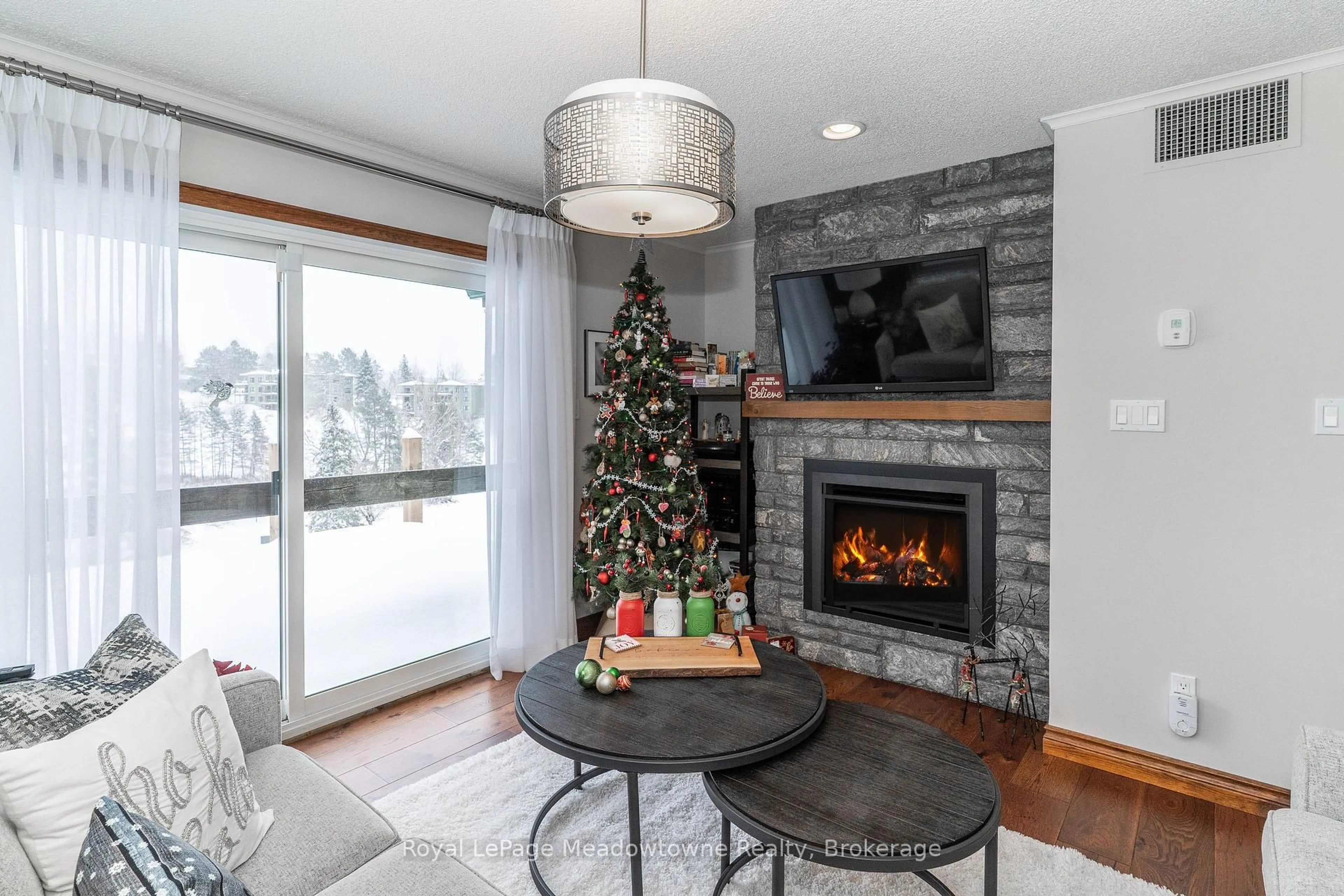 Living room with furniture, unknown for 34 Deerhurst Greens Rd #301, Huntsville Ontario P1H 1A9