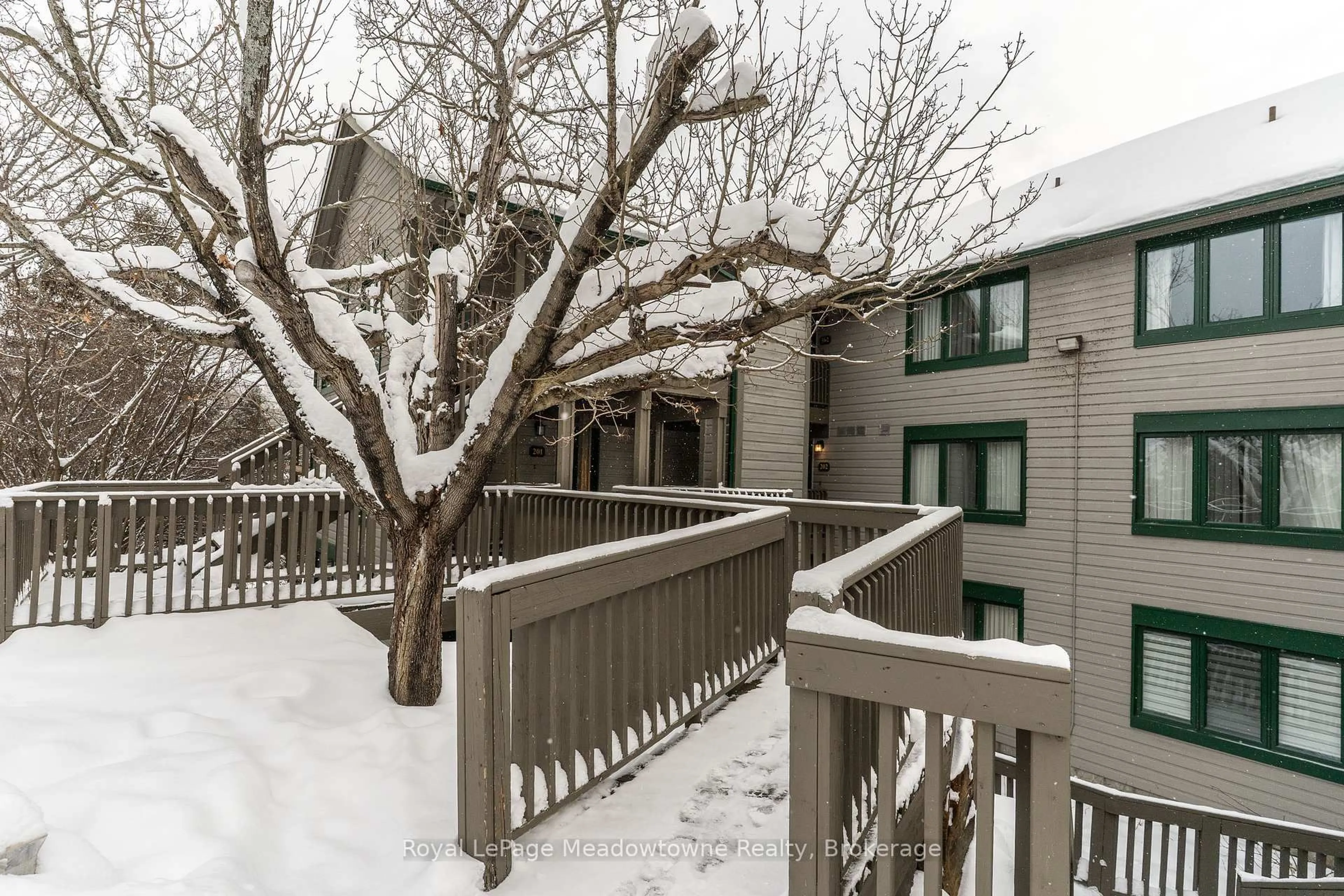 Patio, street for 34 Deerhurst Greens Rd #301, Huntsville Ontario P1H 1A9