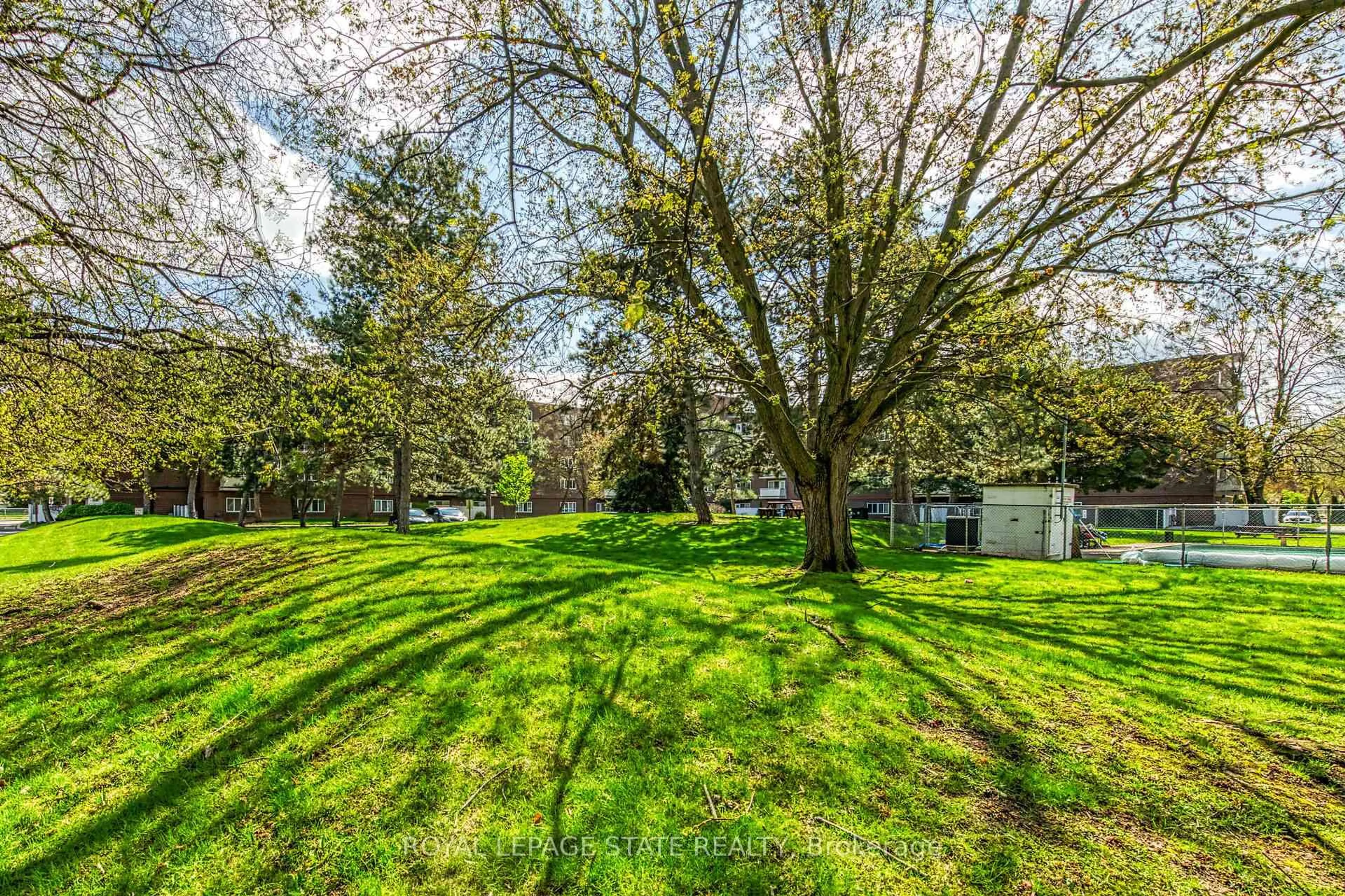 A pic from outside/outdoor area/front of a property/back of a property/a pic from drone, forest/trees view for 198 Scott St #220, St. Catharines Ontario L2N 5T3