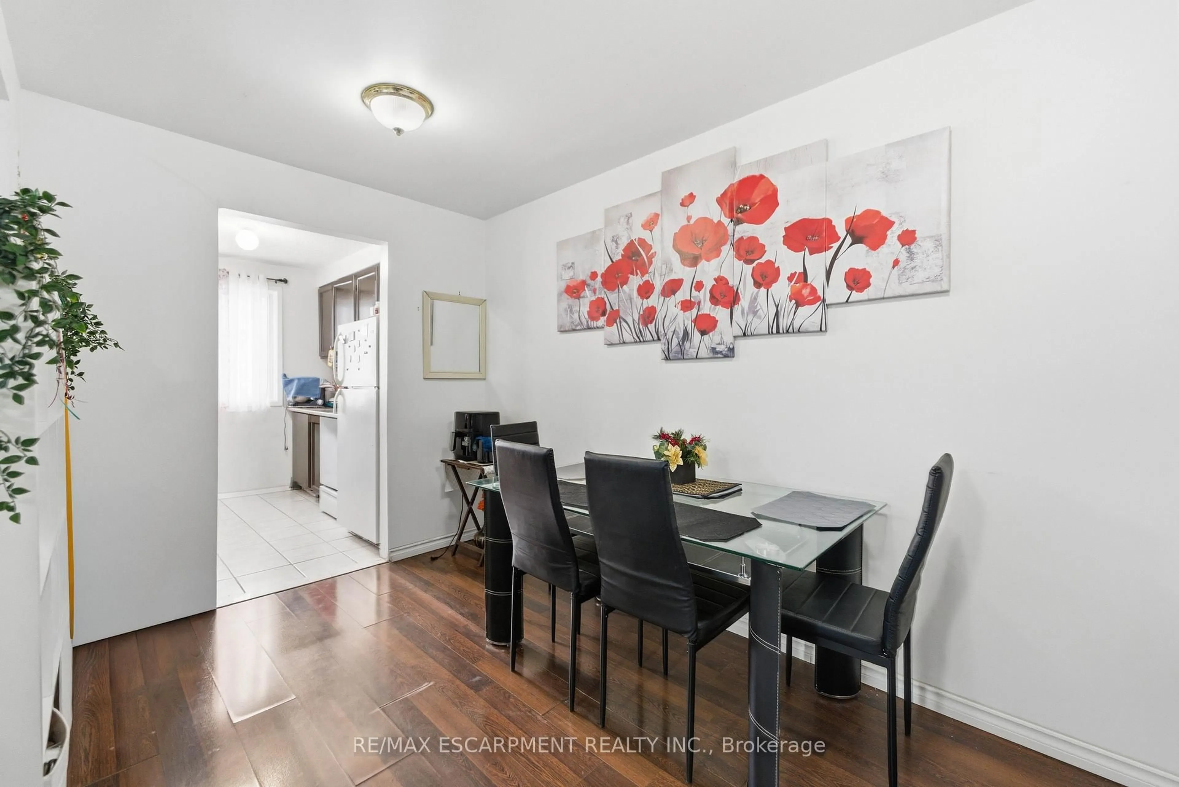 Dining room, wood/laminate floor for 262 KENORA Ave #2, Hamilton Ontario L8E 3Y3