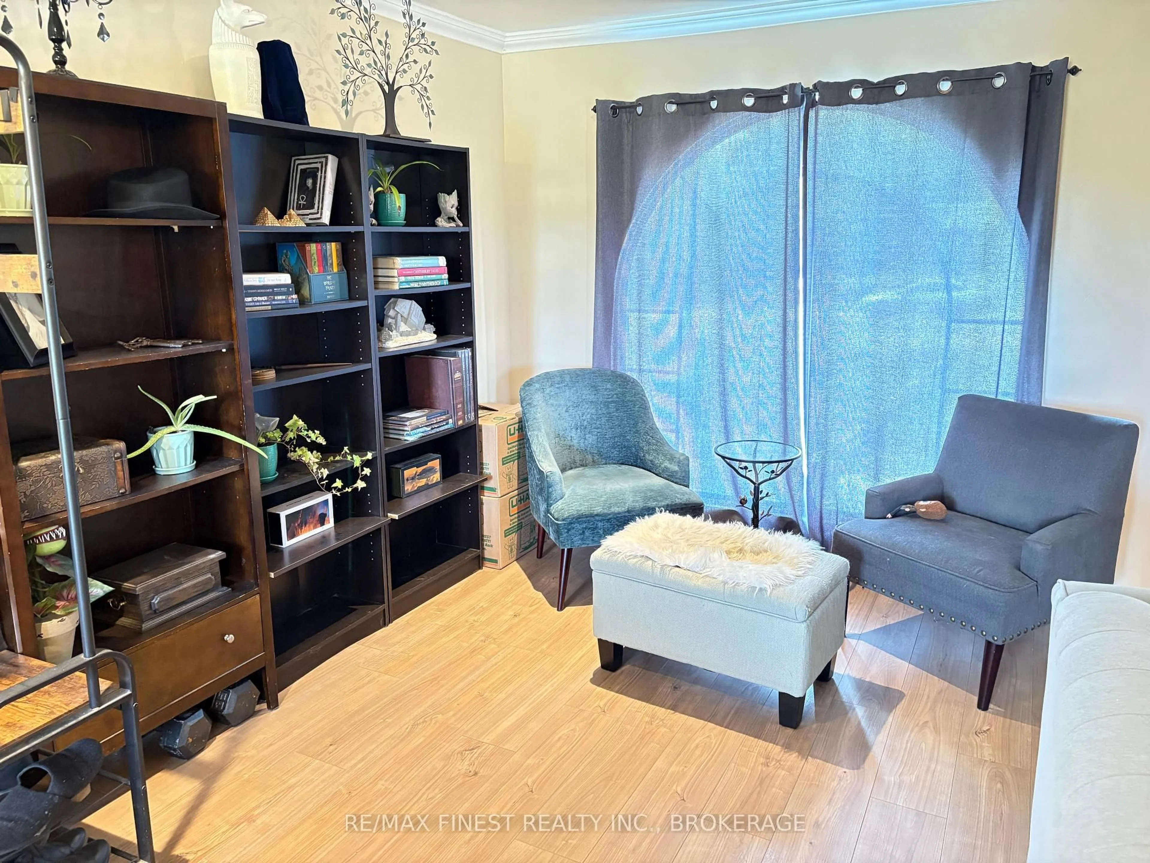 Living room with furniture, wood/laminate floor for 5008 Highway 38, Harrowsmith Ontario K0H 1V0