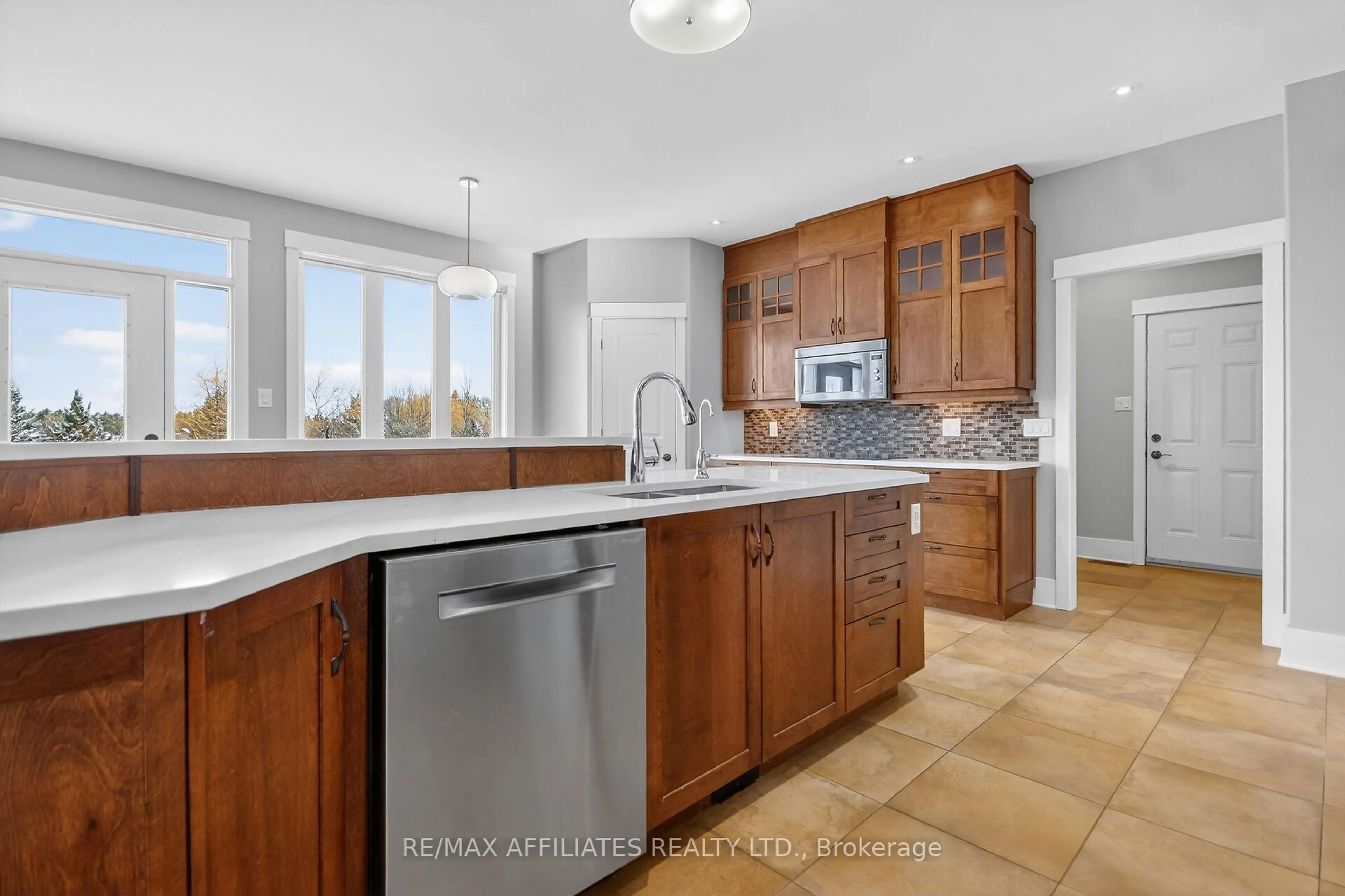 Open concept kitchen, ceramic/tile floor for 500 Bradbury Crt, Ottawa Ontario K2W 0A1