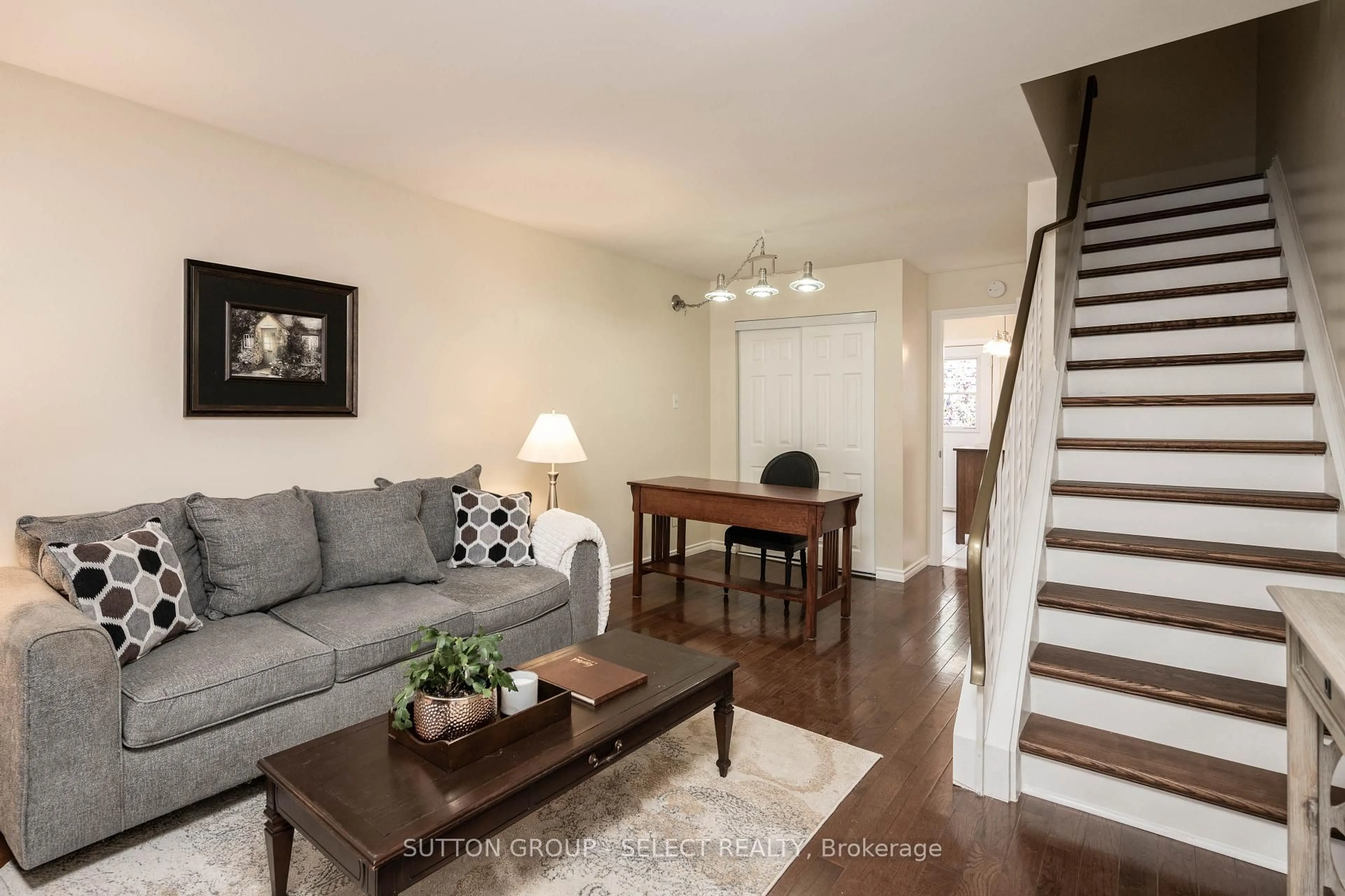 Living room with furniture, wood/laminate floor for 111 WELLESLEY Cres #G, London East Ontario N5V 1J6