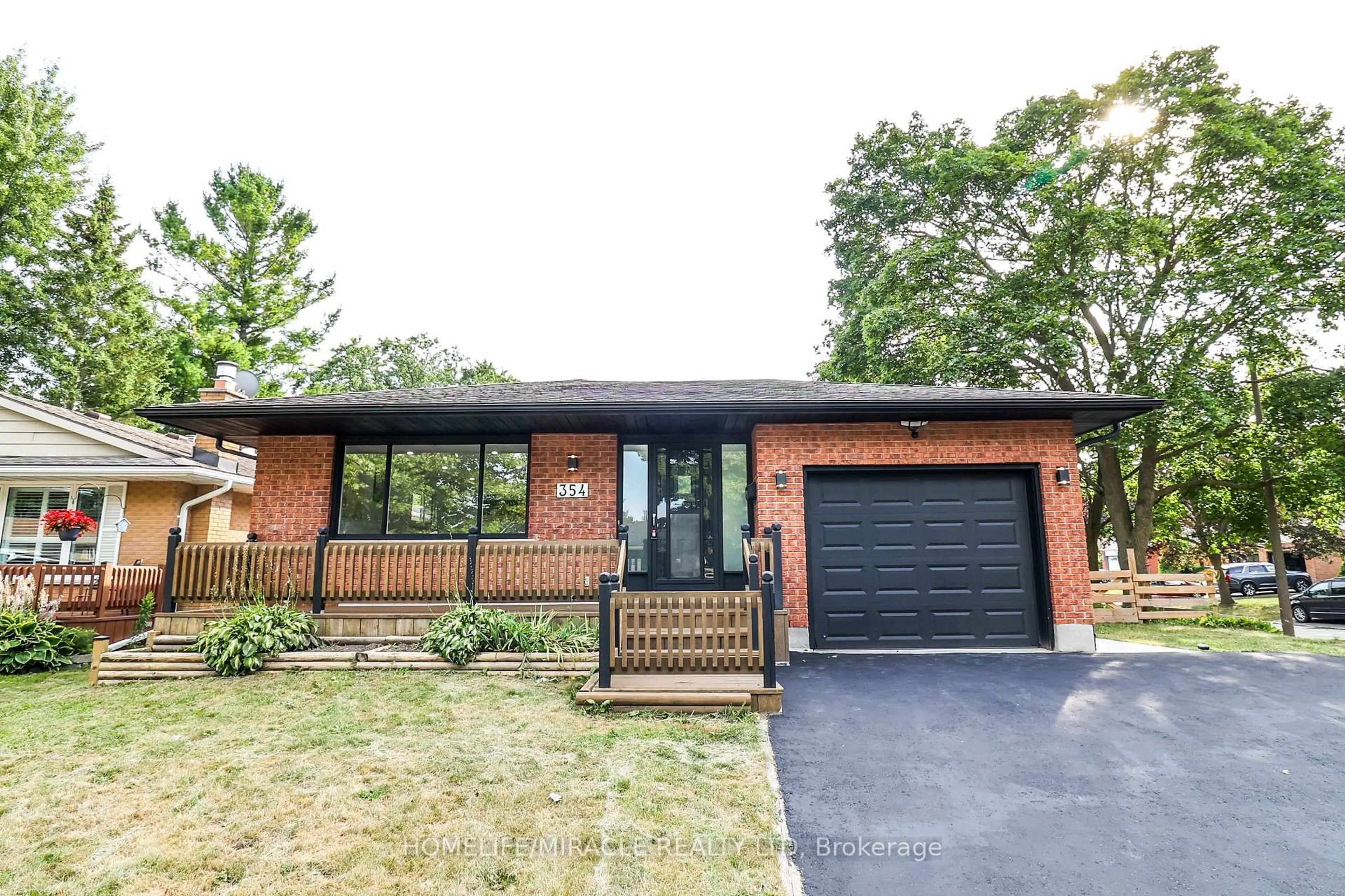 Home with brick exterior material, street for 354 Lee Circ, Waterloo Ontario N2K 2L9