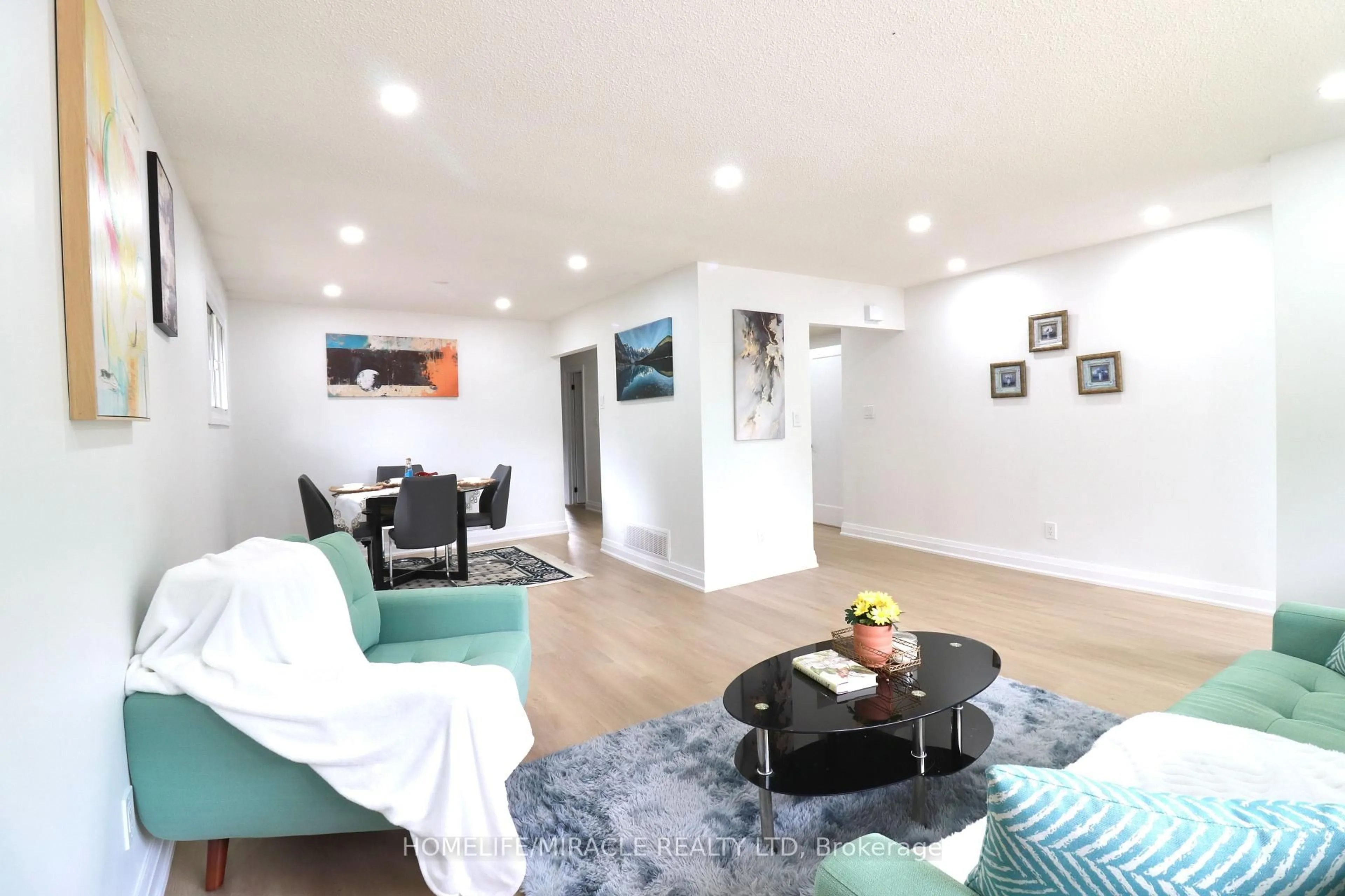 Living room with furniture, wood/laminate floor for 354 Lee Circ, Waterloo Ontario N2K 2L9