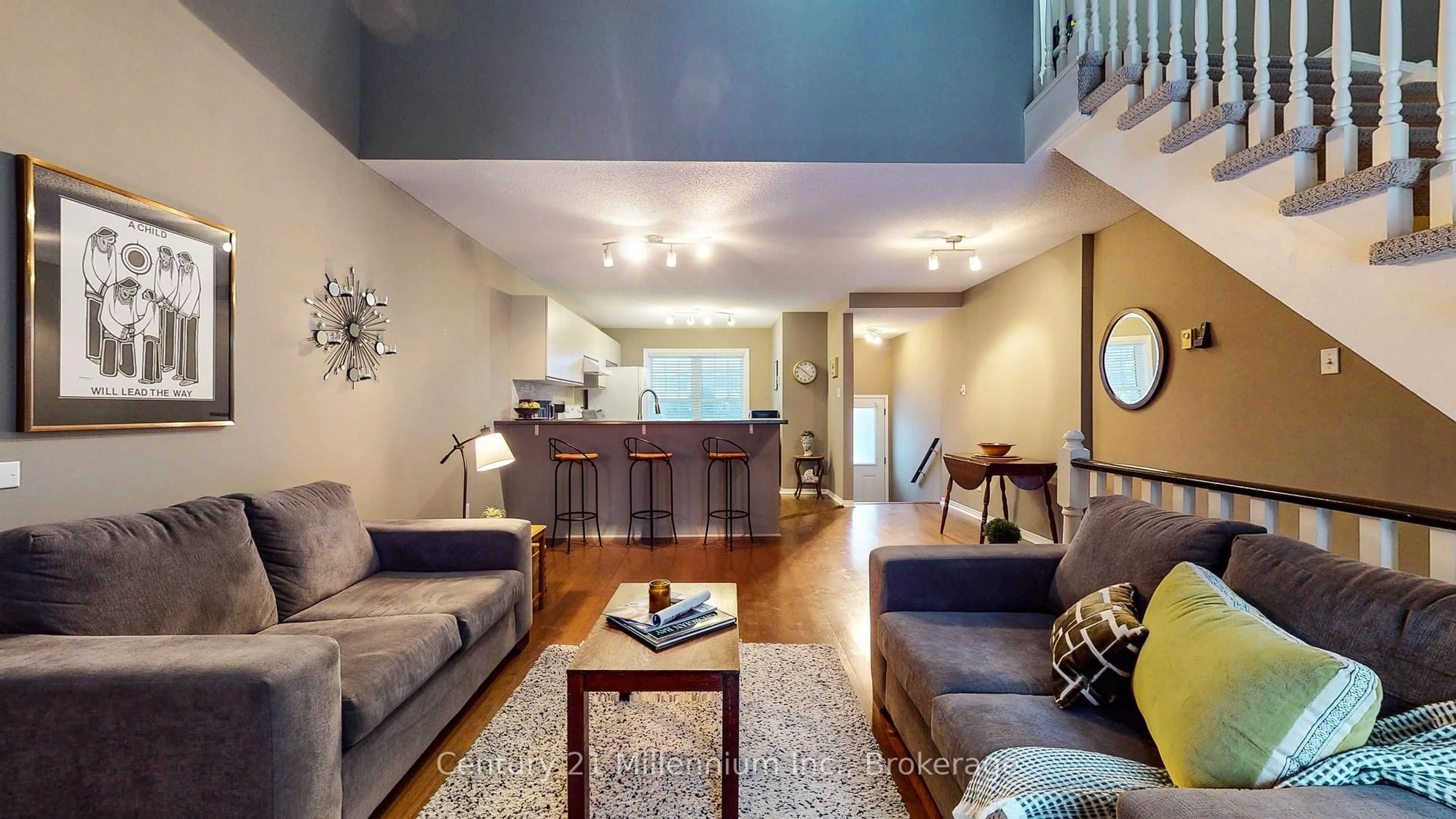 Living room with furniture, wood/laminate floor for 150 Victoria St #124, Blue Mountains Ontario N0H 2P0