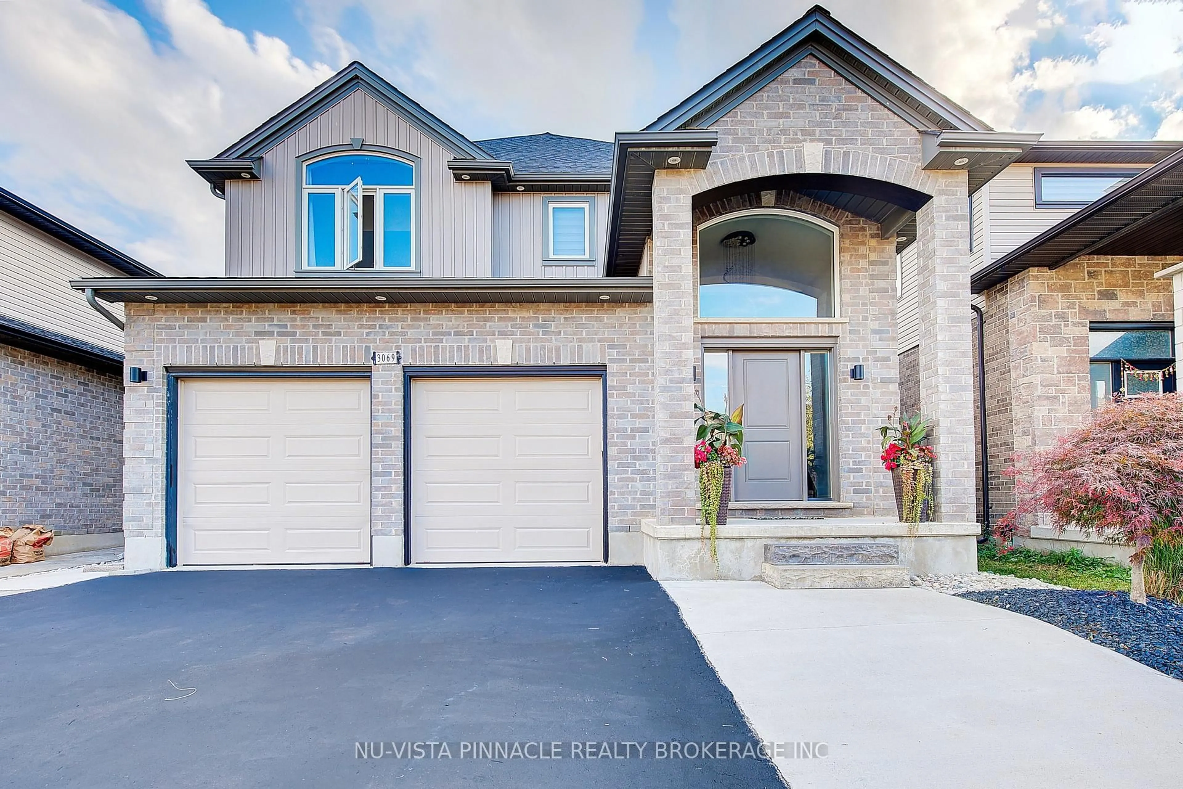 Home with brick exterior material, street for 3069 Tokala Tr, London North Ontario N6G 0S7