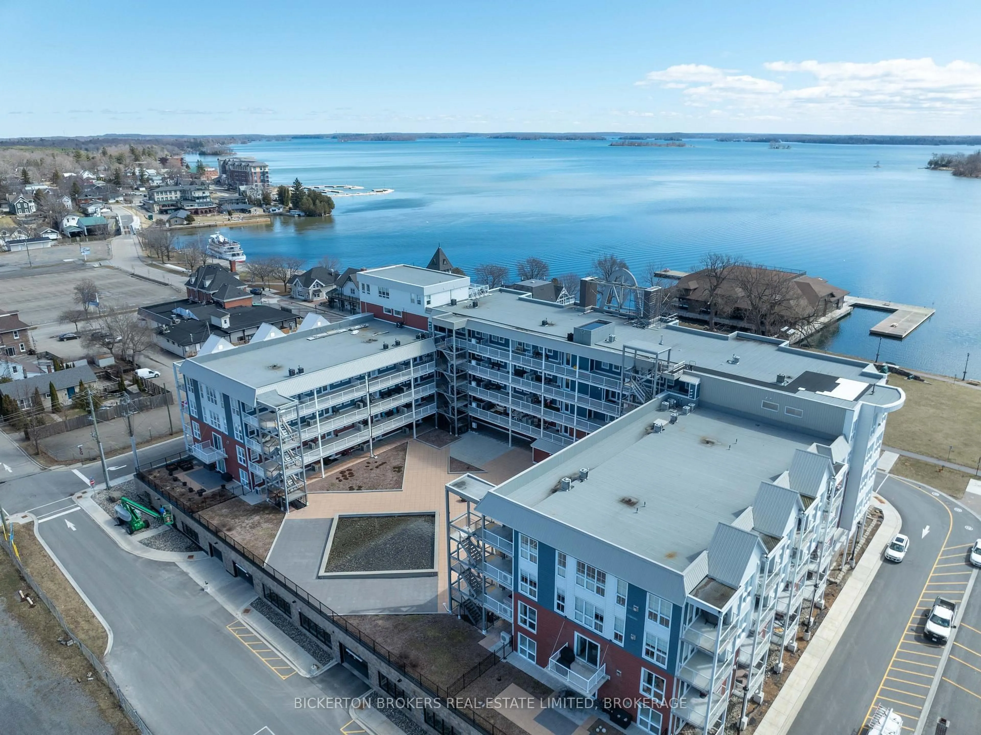 A pic from outside/outdoor area/front of a property/back of a property/a pic from drone, unknown for 130 Water St #403, Gananoque Ontario K7G 0A8