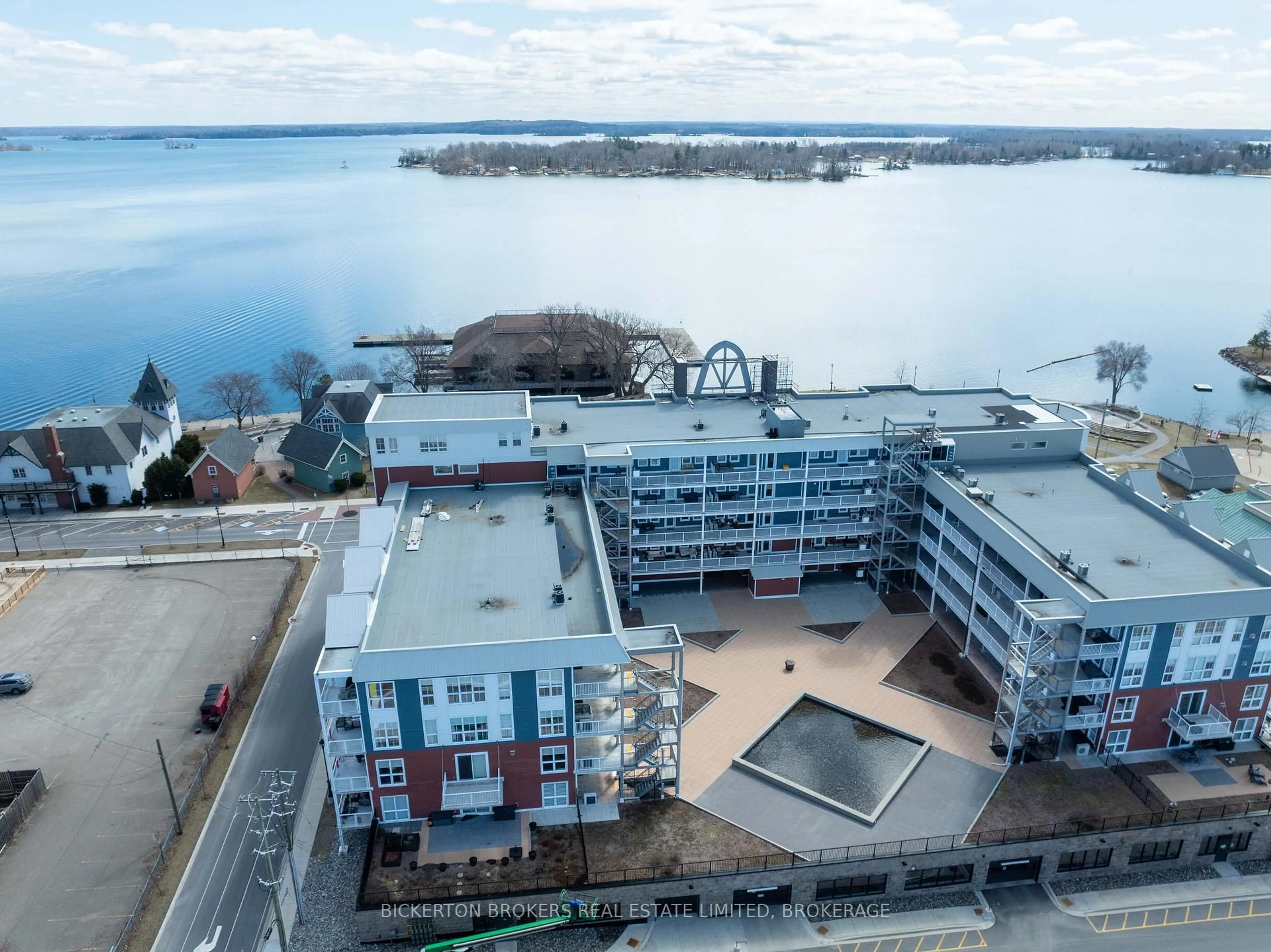 A pic from outside/outdoor area/front of a property/back of a property/a pic from drone, water/lake/river/ocean view for 130 Water St #403, Gananoque Ontario K7G 0A8