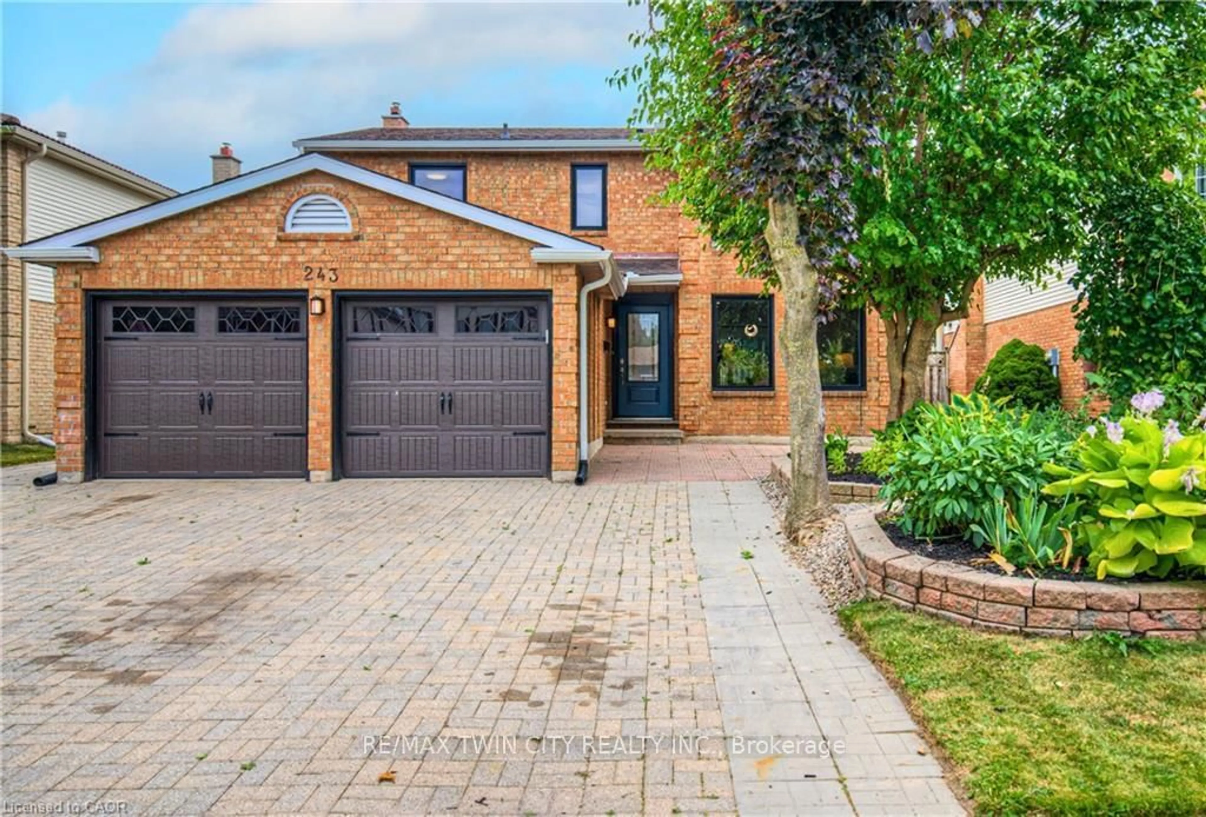 Home with brick exterior material, street for 243 Highview Dr, Kitchener Ontario N2N 2K6