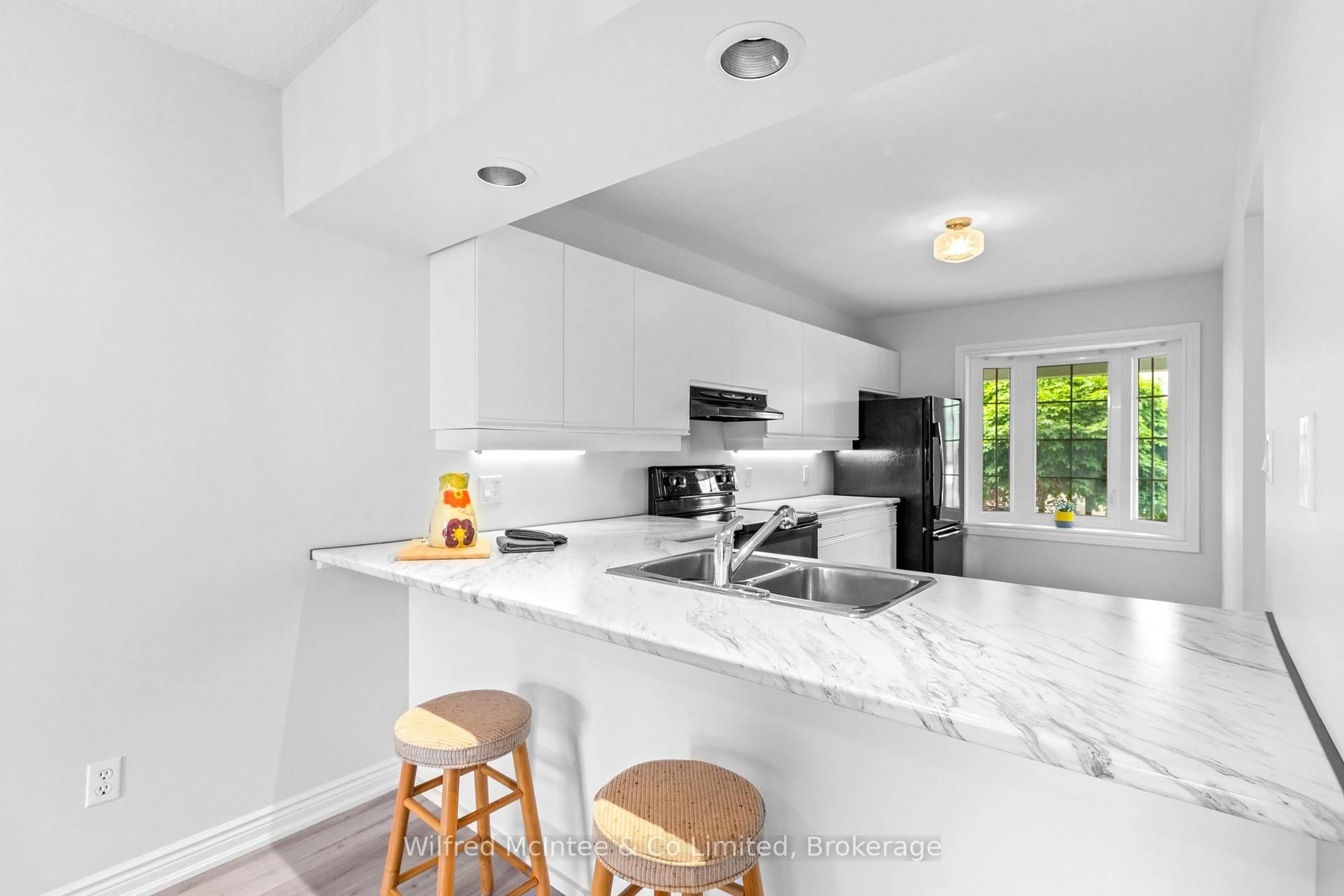 Open concept kitchen, ceramic/tile floor for 834 Arlington St #9, Saugeen Shores Ontario N0H 2C4