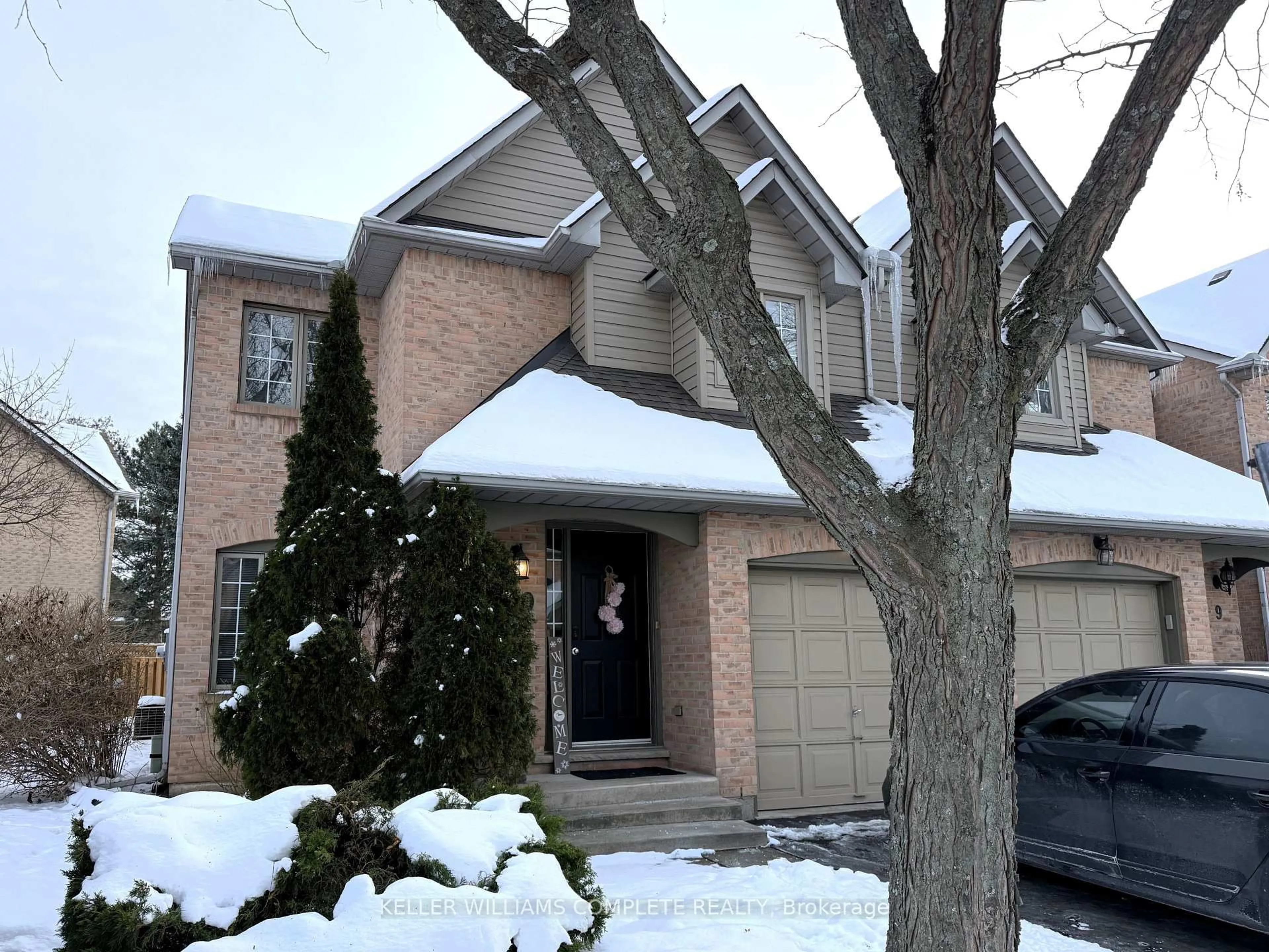 Home with brick exterior material, street for 320 Hamilton Dr #10, Hamilton Ontario L9G 4W6