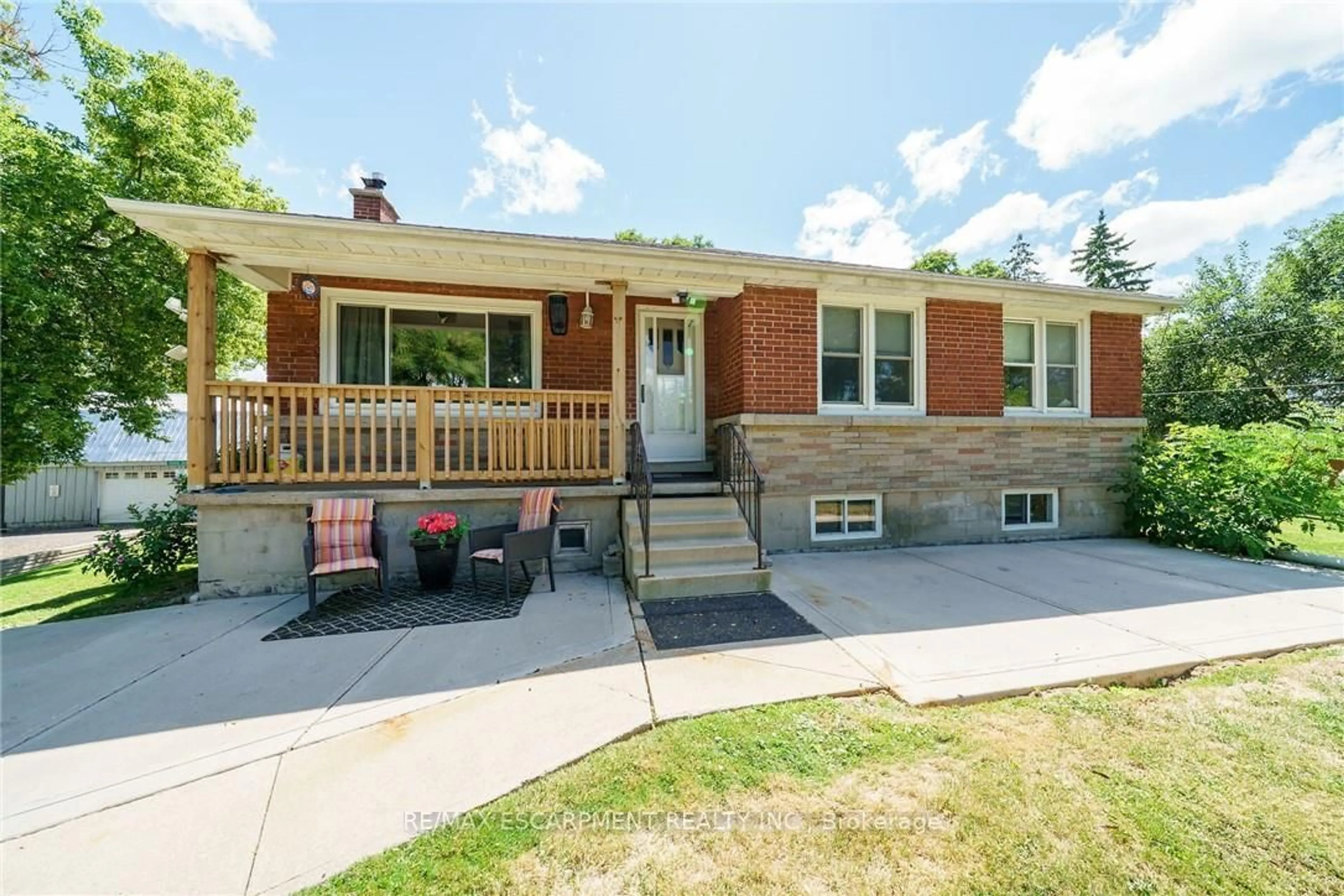 Home with brick exterior material, street for 226 Carluke Rd, Hamilton Ontario L9G 3L1