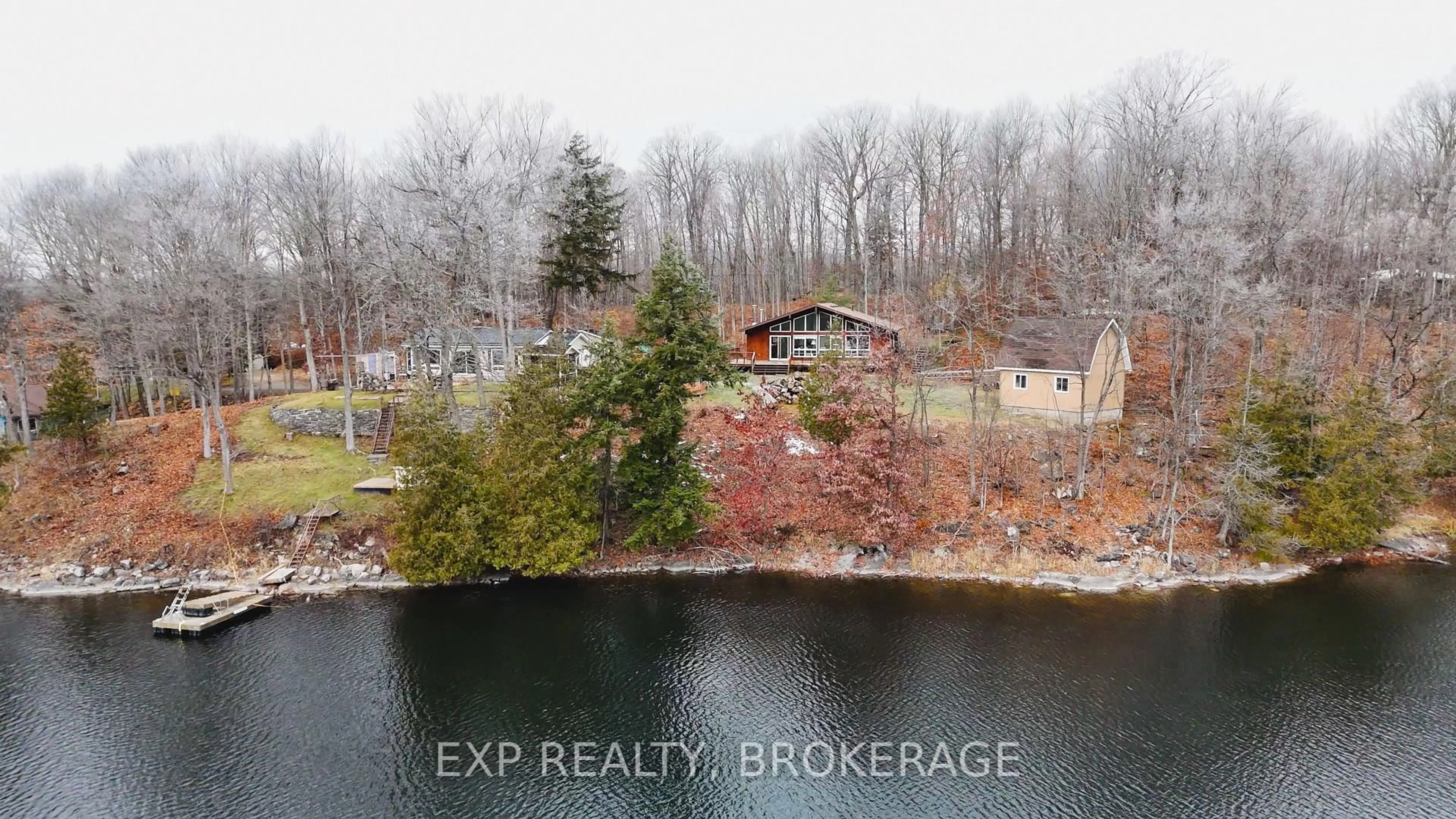 A pic from outside/outdoor area/front of a property/back of a property/a pic from drone, water/lake/river/ocean view for 2103 Hambly Lane, Hartington Ontario K0H 1W0