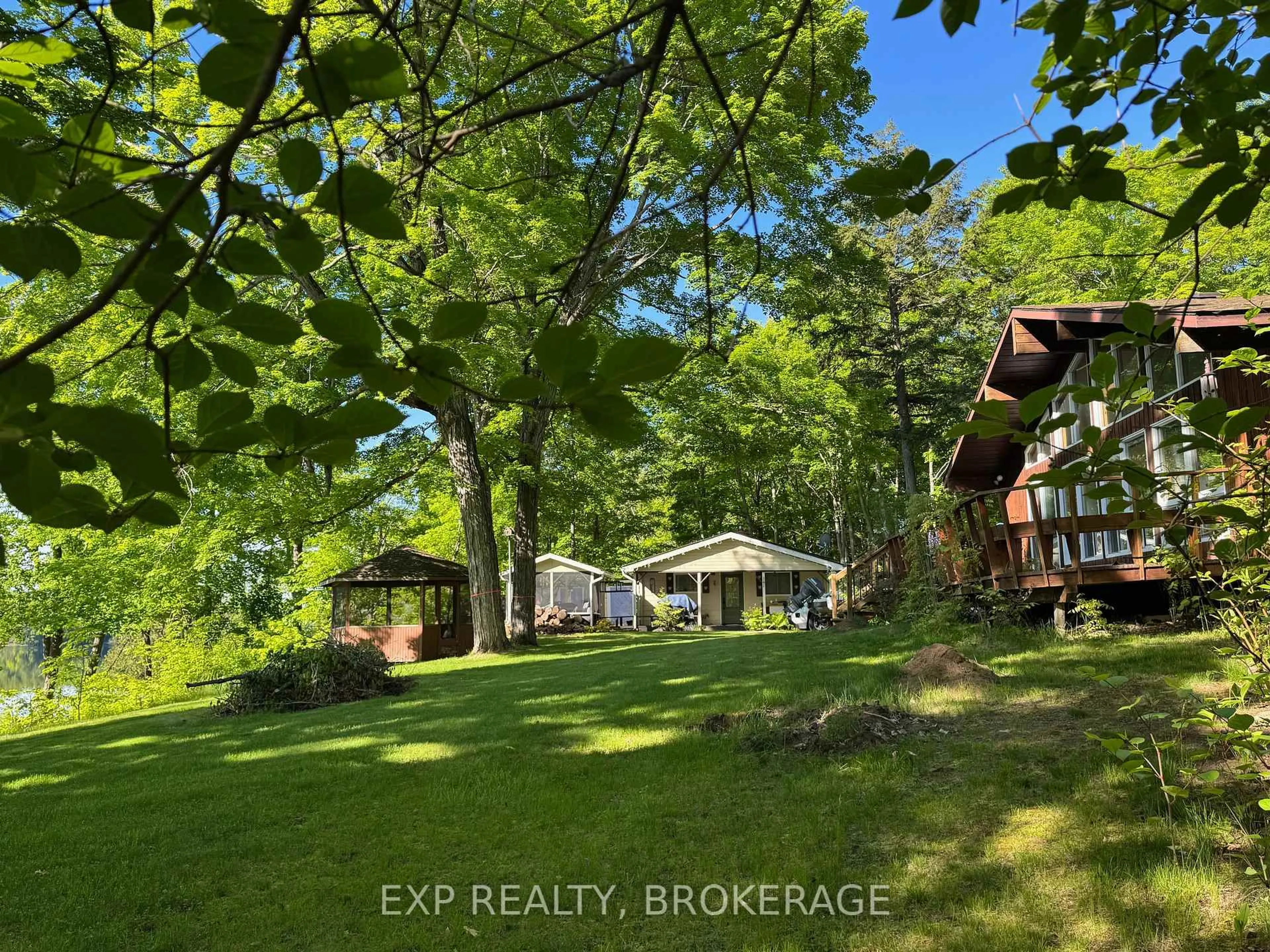 A pic from outside/outdoor area/front of a property/back of a property/a pic from drone, forest/trees view for 2107 Hambly Lane, Hartington Ontario K0H 1W0