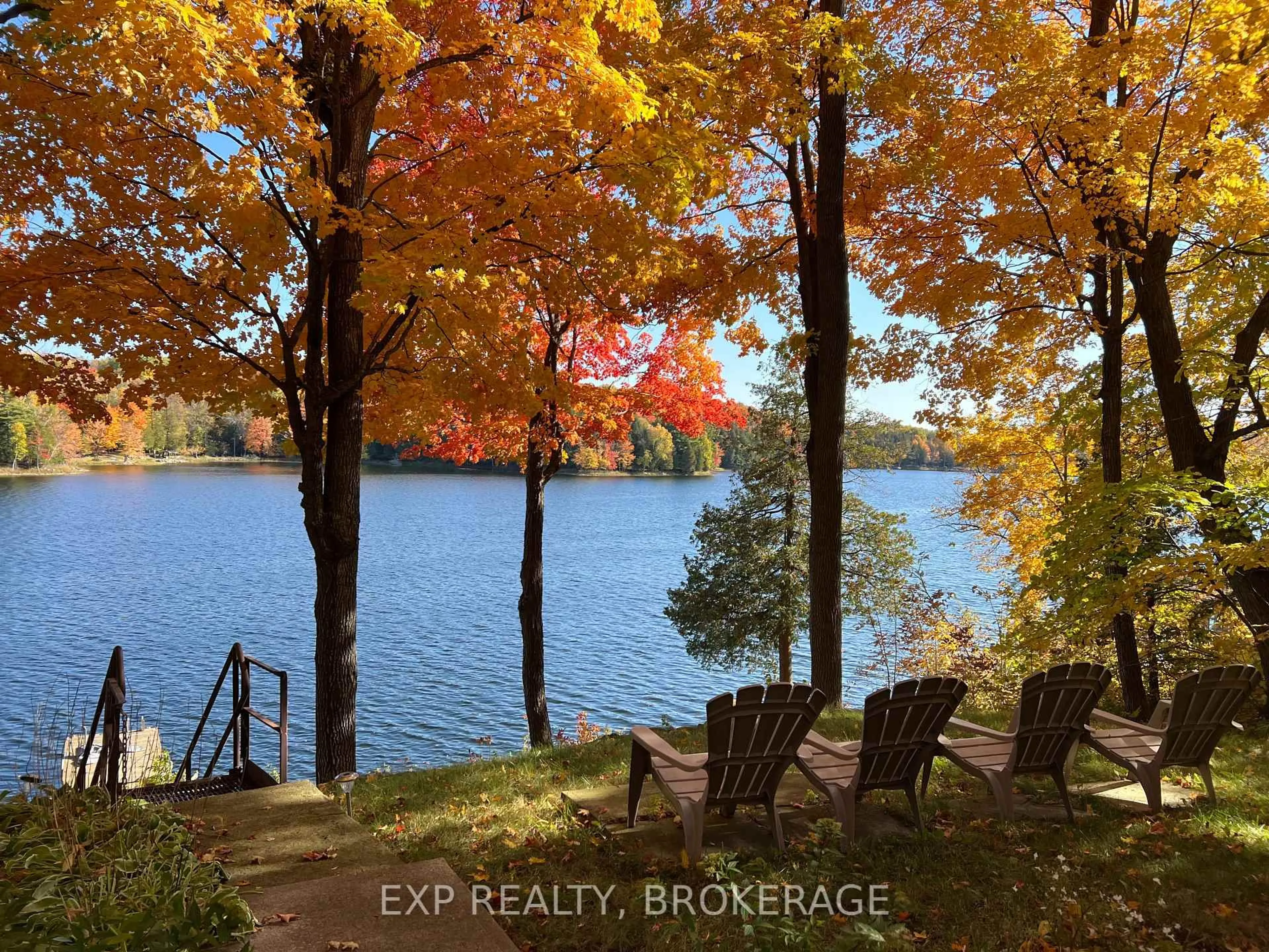 A pic from outside/outdoor area/front of a property/back of a property/a pic from drone, water/lake/river/ocean view for 2107 Hambly Lane, Hartington Ontario K0H 1W0