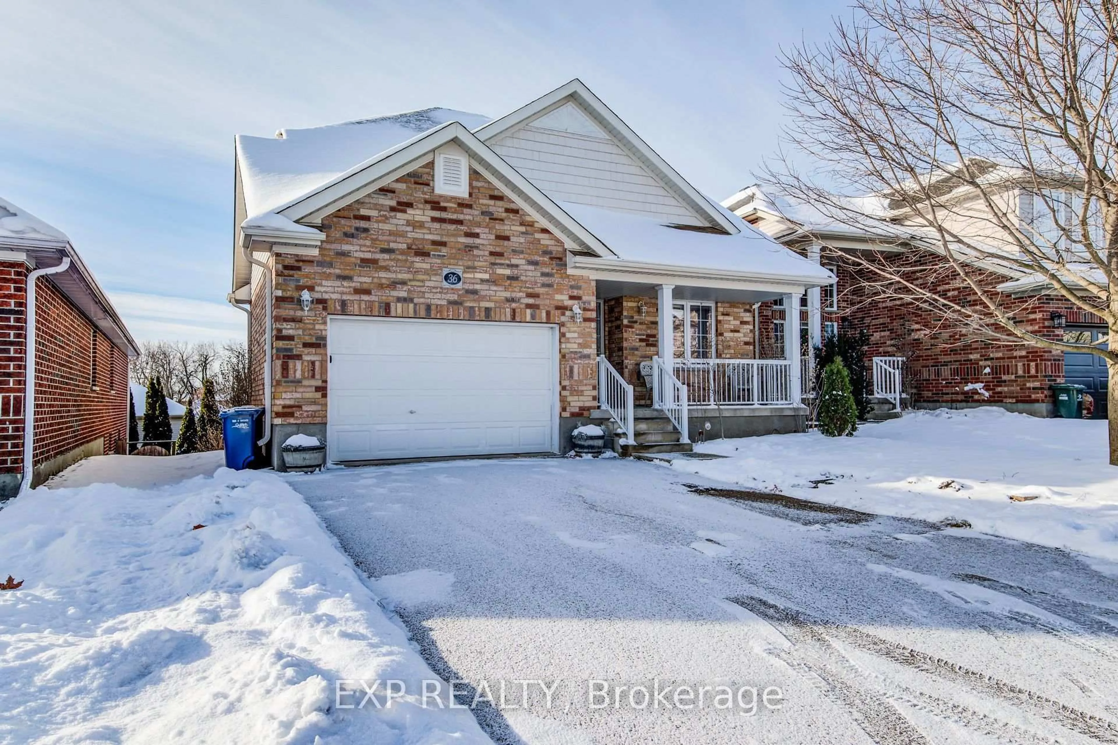 Home with brick exterior material, street for 36 Washburn Dr, Guelph Ontario N1E 0B6